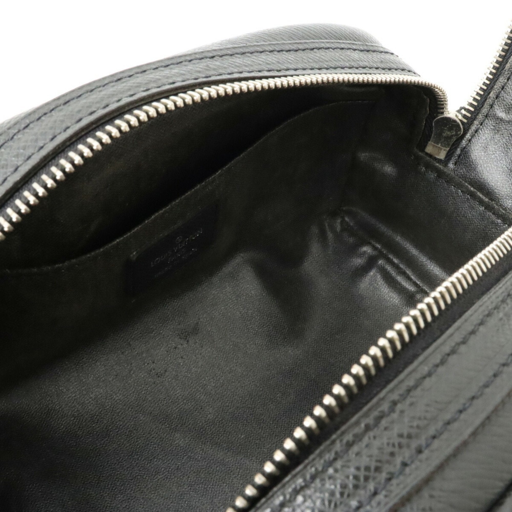 Louis Vuitton Trousse Ivan  Leather Clutch Bag