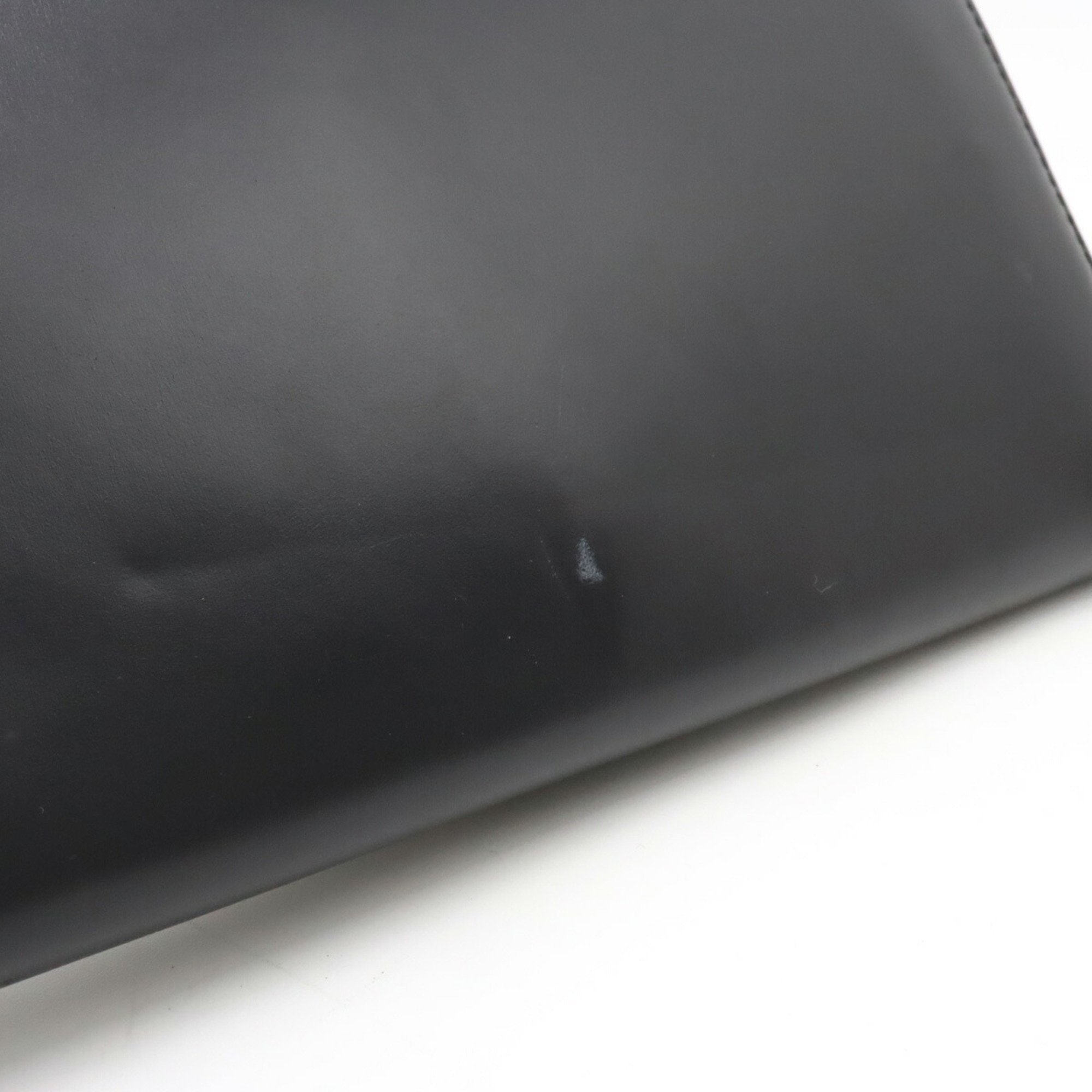 Louis Vuitton Aegean  Leather Clutch Bag