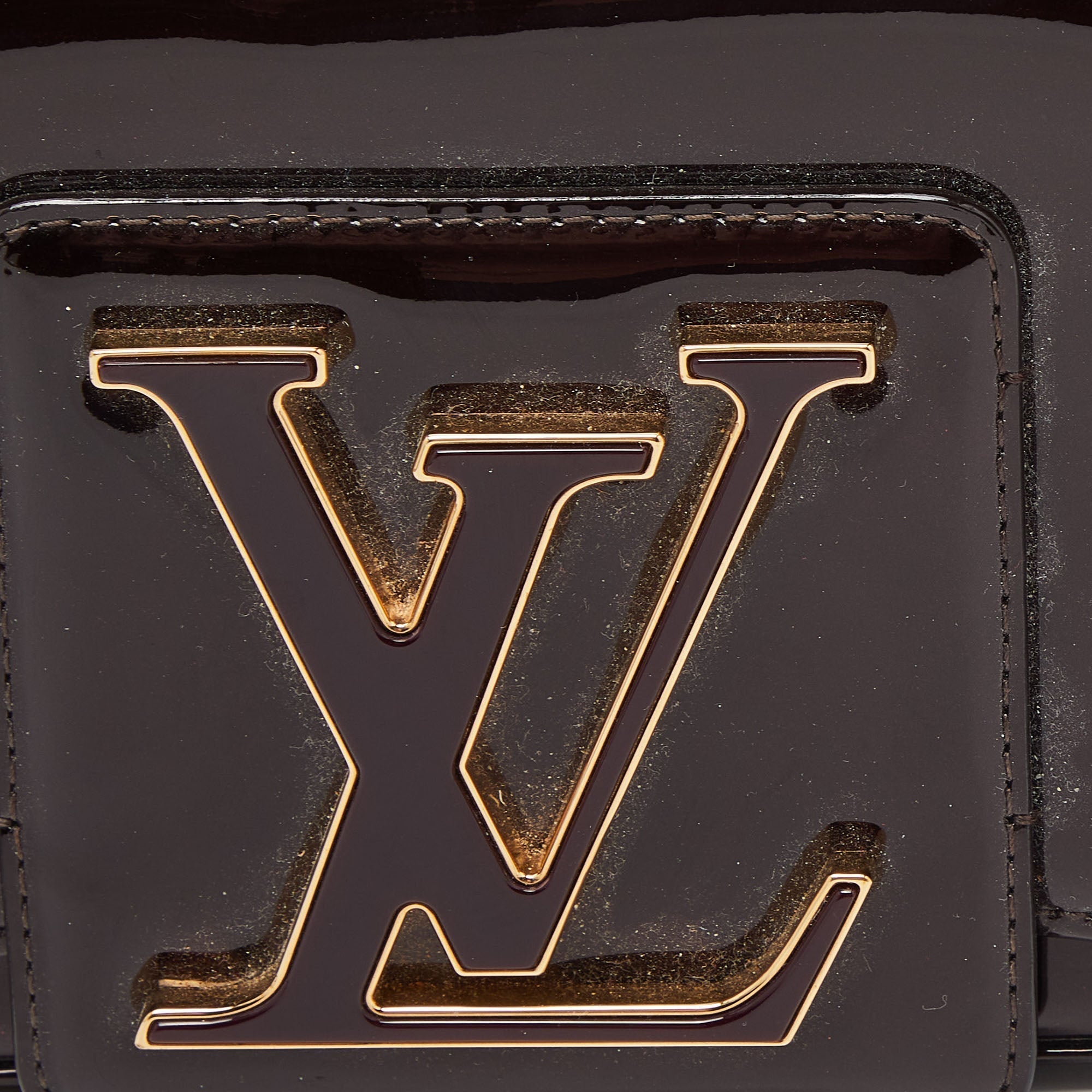 Louis Vuitton Amarante  Leather Sobe Clutch