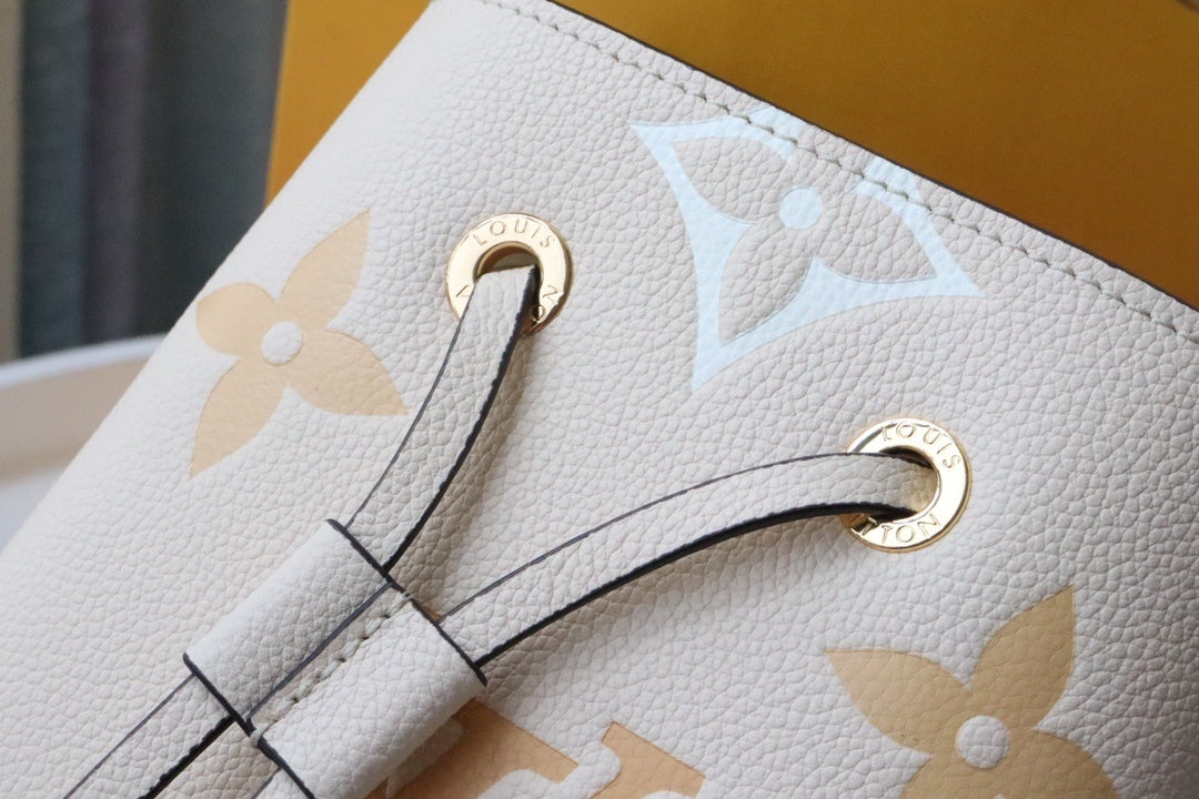 Louis Vuitton NeoNoe BB Bucket Bag Monogram Empreinte Cream/Saffron For Women, Women’s Bags, Shoulder Bags 7.9in/20cm Louis Vuitton M45716