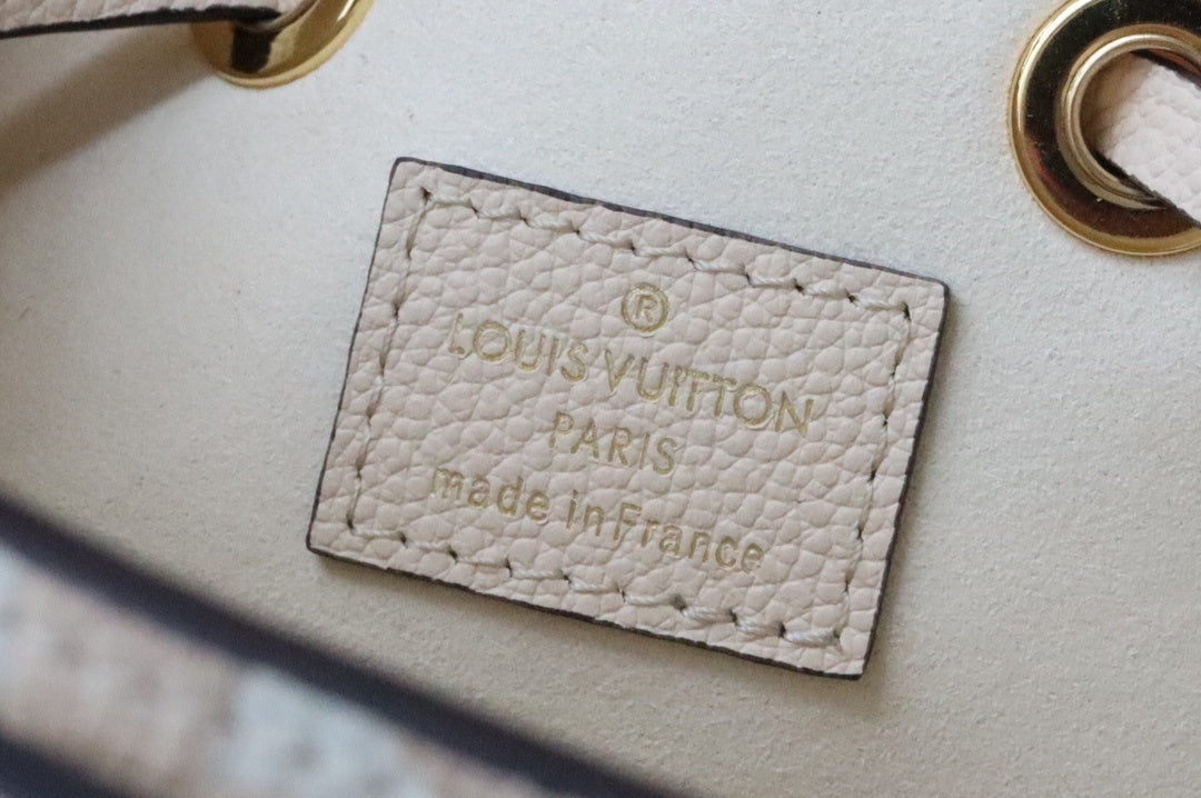 Louis Vuitton NeoNoe BB Bucket Bag Monogram Empreinte Cream/Saffron For Women, Women’s Bags, Shoulder Bags 7.9in/20cm Louis Vuitton M45716