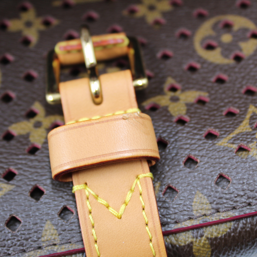 Louis Vuitton Saumur Monagram Perforated Clutch