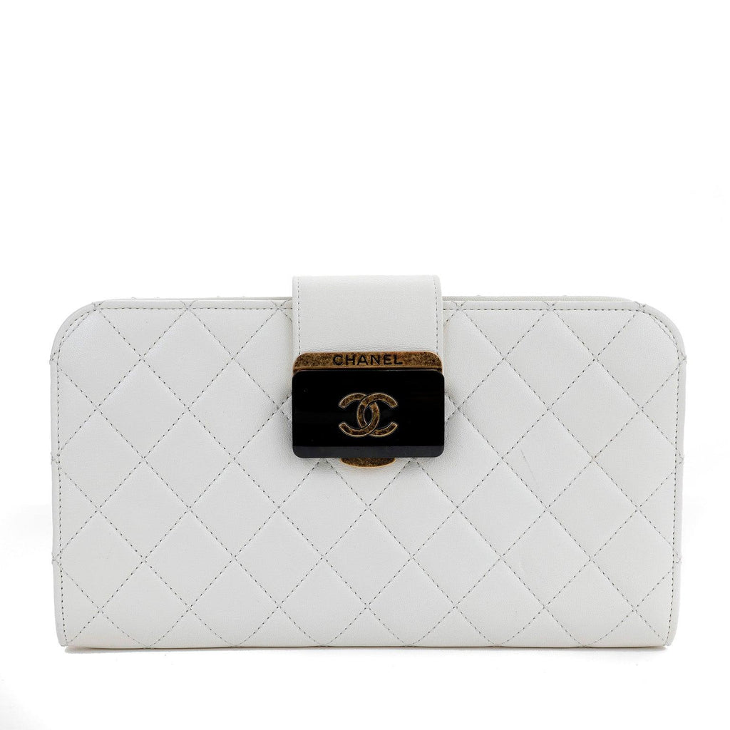 Chanel Ivory Lambskin Clutch with CC Enamel & Bronze Hardware