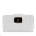 Chanel Ivory Lambskin Clutch with CC Enamel & Bronze Hardware