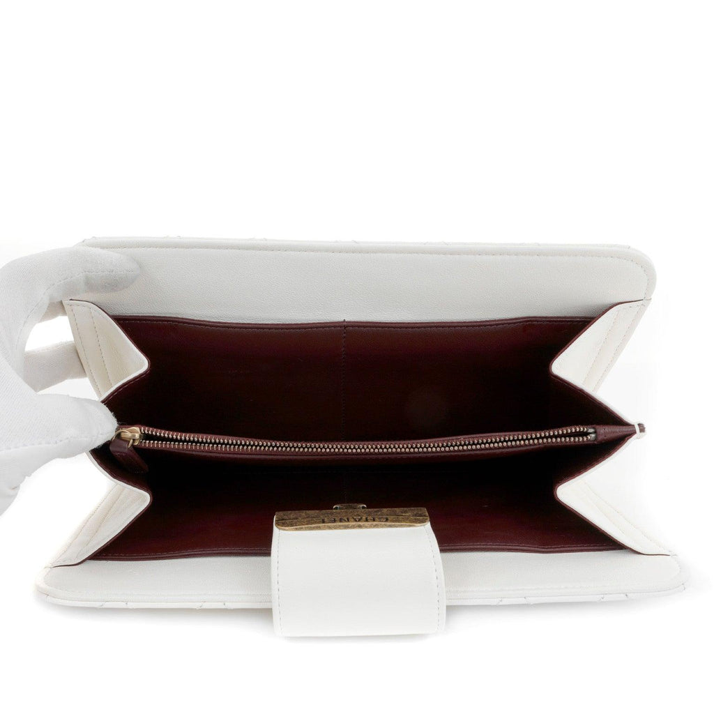 Chanel Ivory Lambskin Clutch with CC Enamel & Bronze Hardware