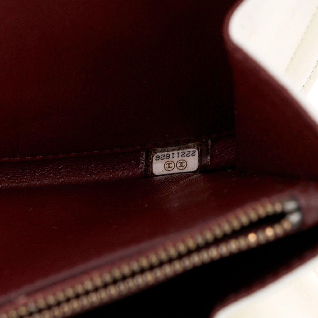 Chanel Ivory Lambskin Clutch with CC Enamel & Bronze Hardware