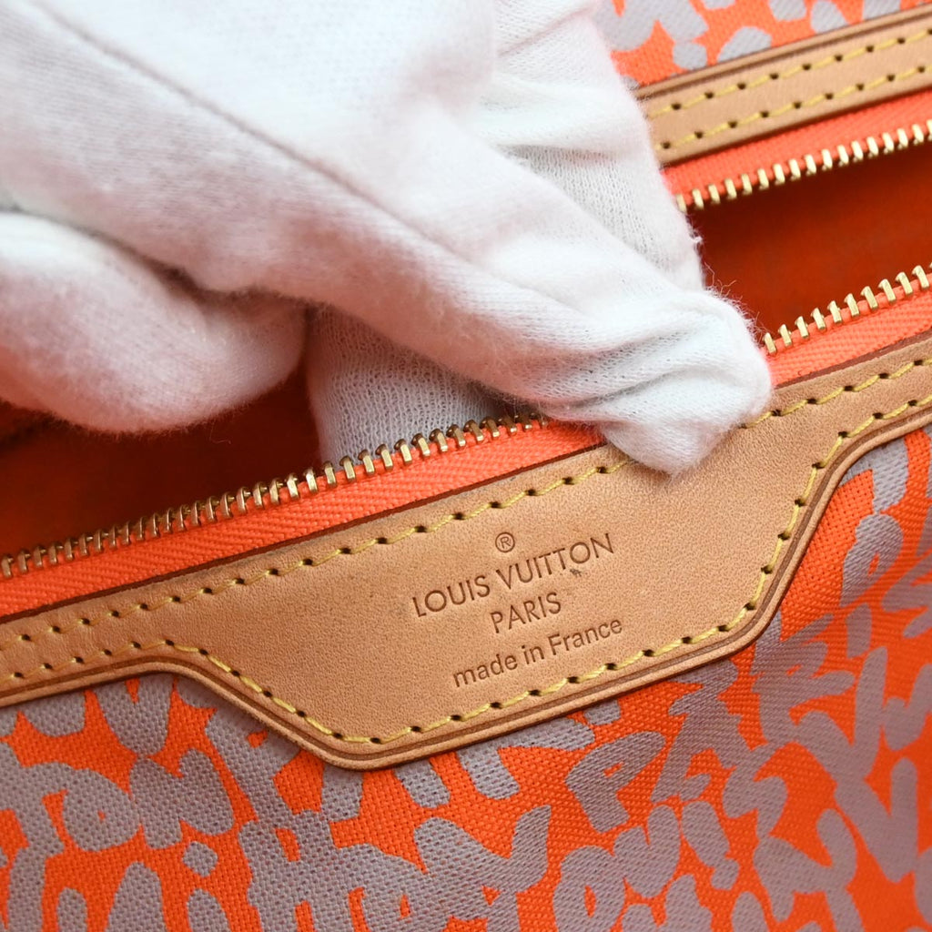 Louis Vuitton 2009 Orange Monogram Neverfull GM Tote Bag M93702