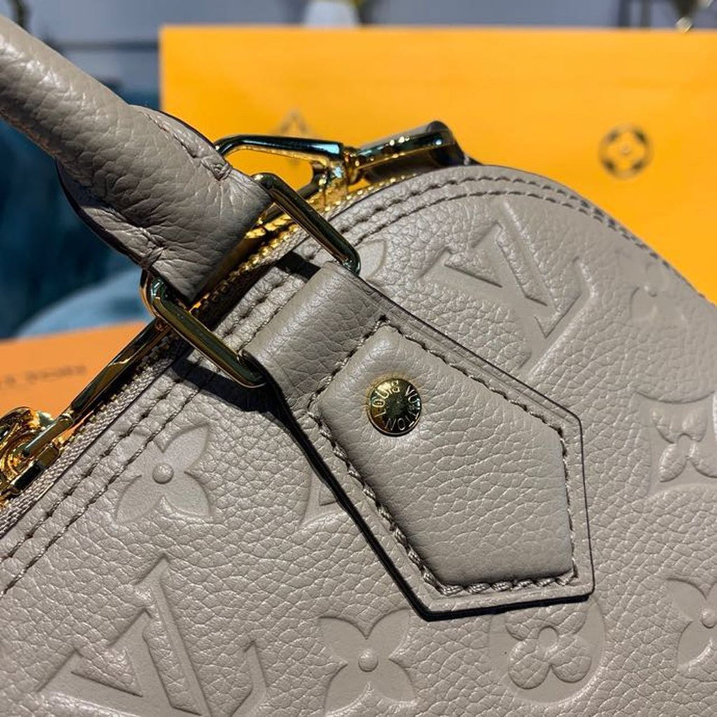 Louis Vuitton Neo Alma Monogram Empreinte Galet Grey For Women,  Shoulder And Crossbody Bags 9.8in/25cm Louis Vuitton