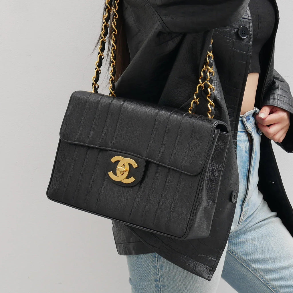 Chanel * 1994-1996 Black Caviar Jumbo Vertical Stitch Classic Flap