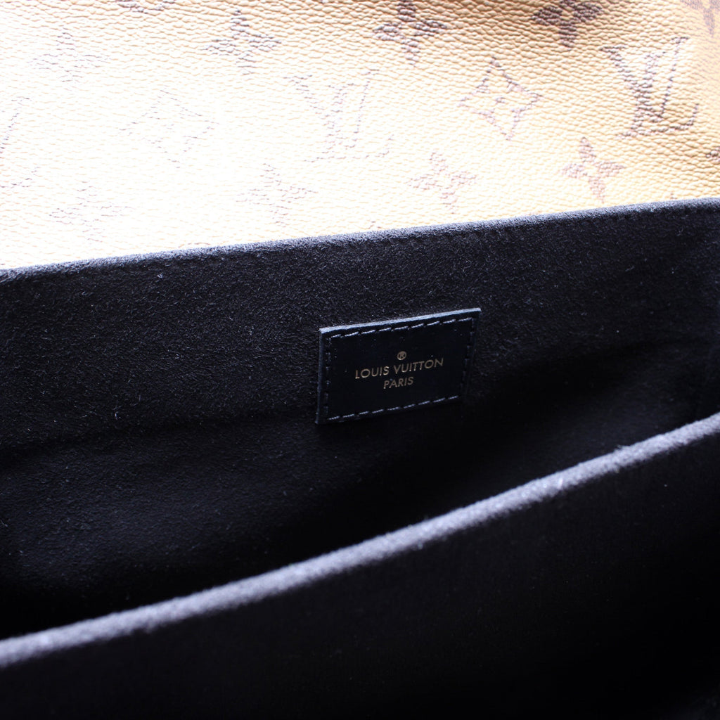 Pochette Metis Reverse Monogram
