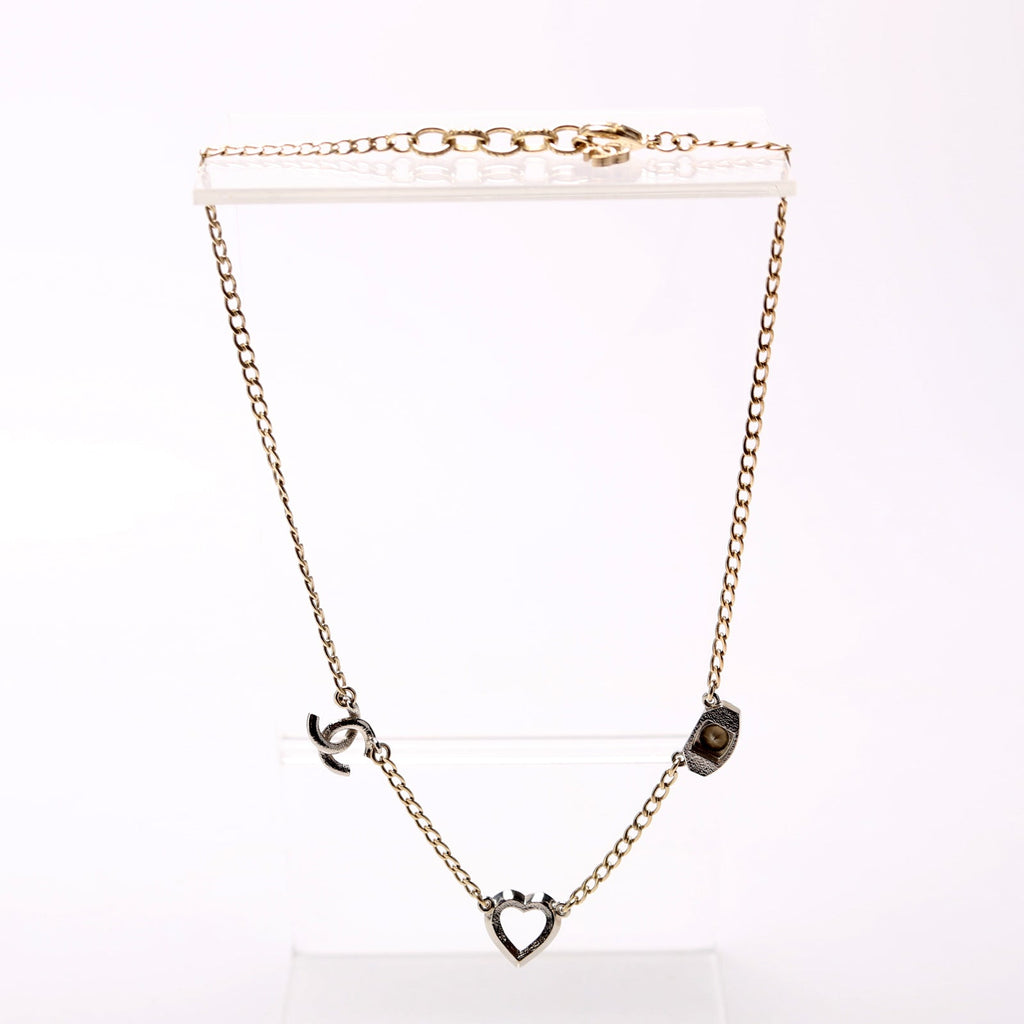 Chanel Crystal Eye Heart CC Necklace