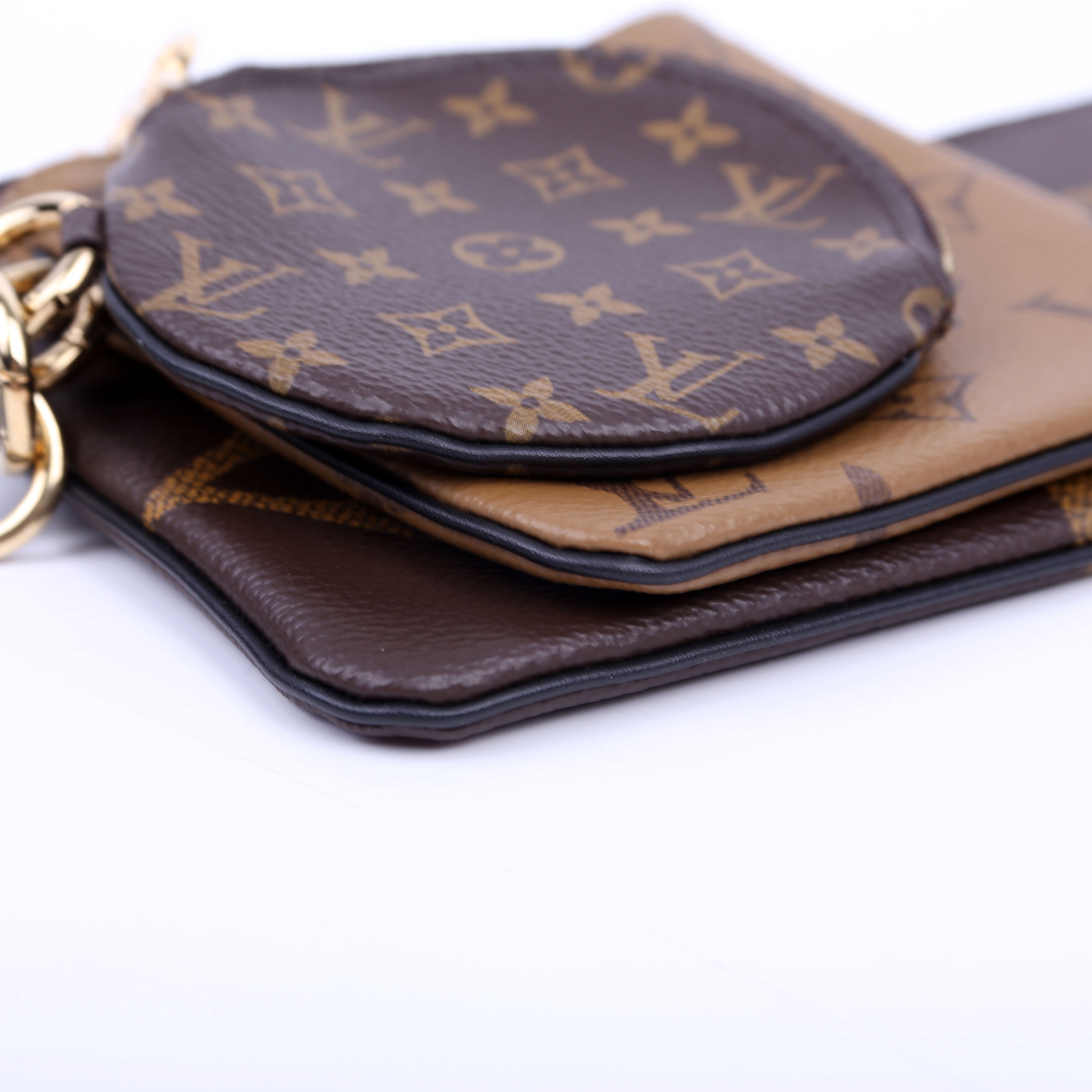 Louis Vuitton Trio Pochette Reversed Monogram