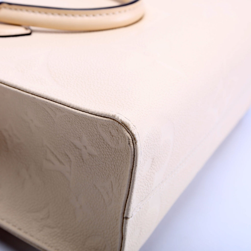 Louis Vuitton ONTHEGO PM Empreinte Cream
