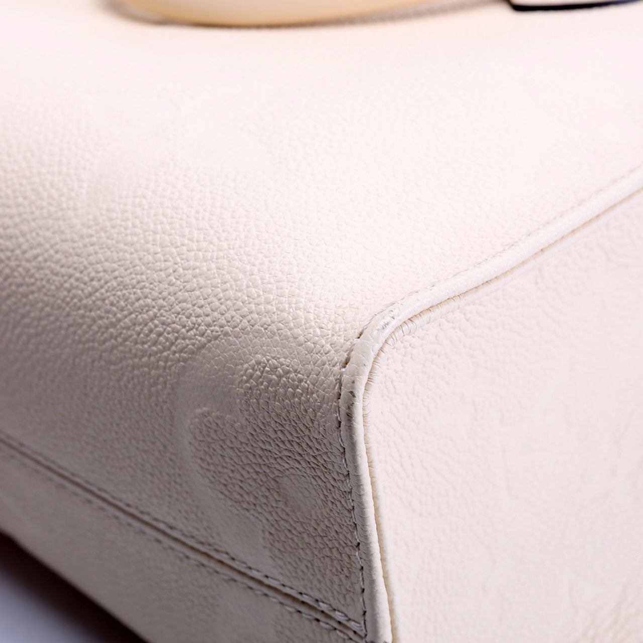 Louis Vuitton ONTHEGO PM Empreinte Cream