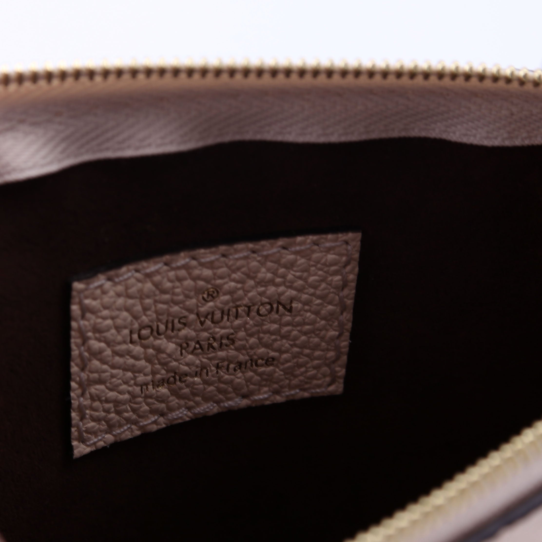 Louis Vuitton Pochette Only Carryfall PM Empreinte White