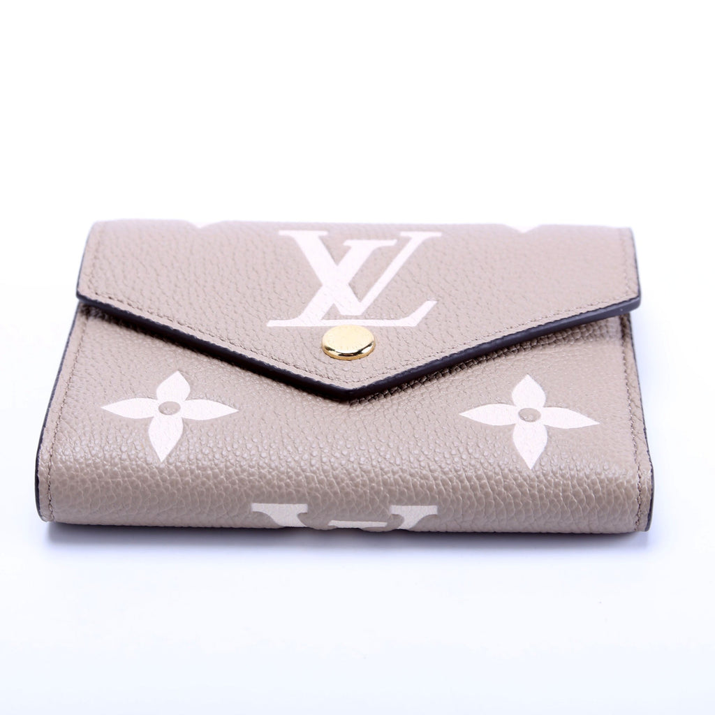 Louis Vuitton Victorine Wallet Bicolor Empreinte Turtle Dove