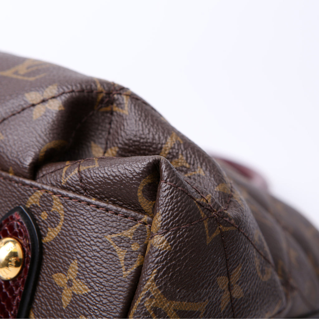 Louis Vuitton Etoile Exotique MM Monogram