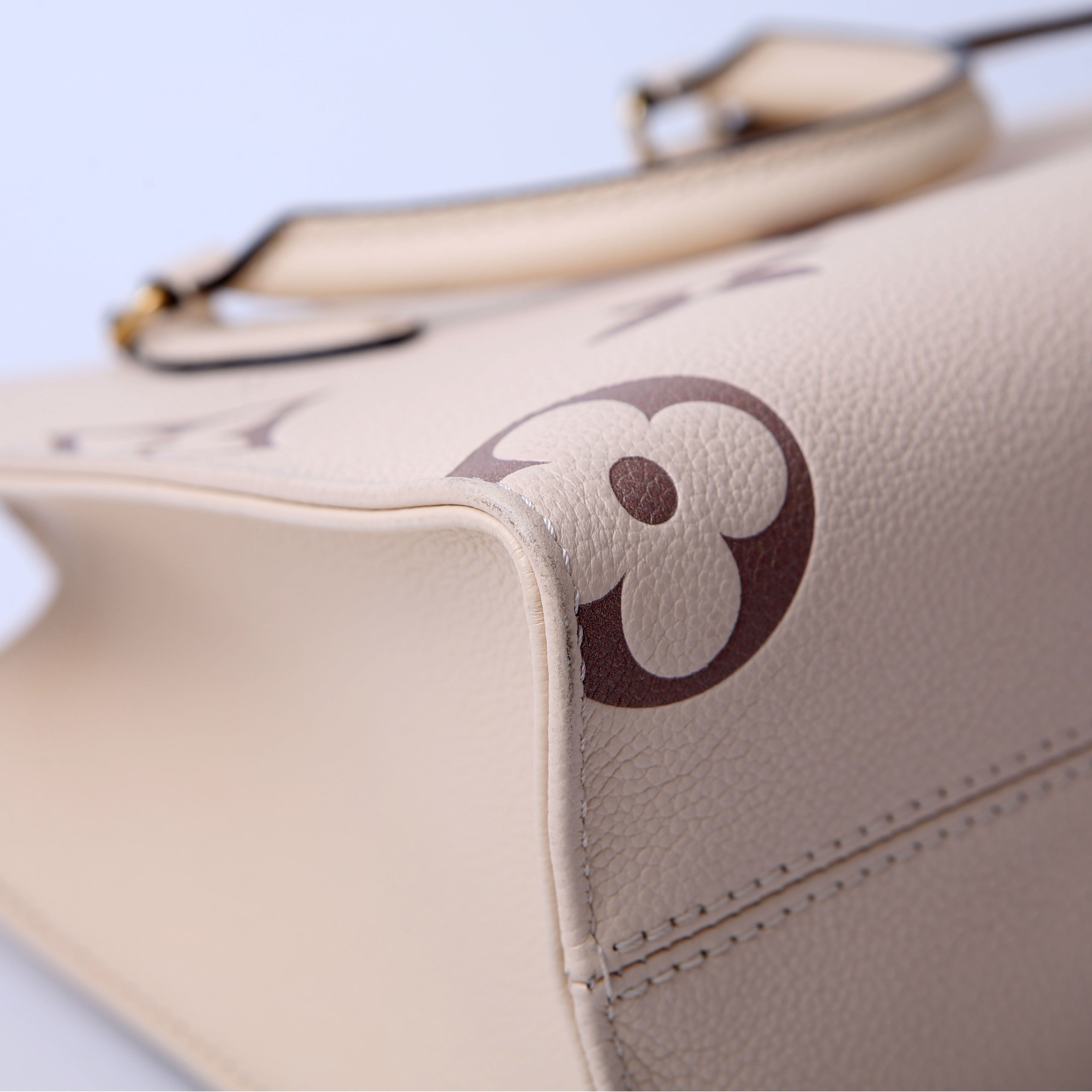 Louis Vuitton ONTHEGO PM Bicolor Empreinte Cream/Taupe