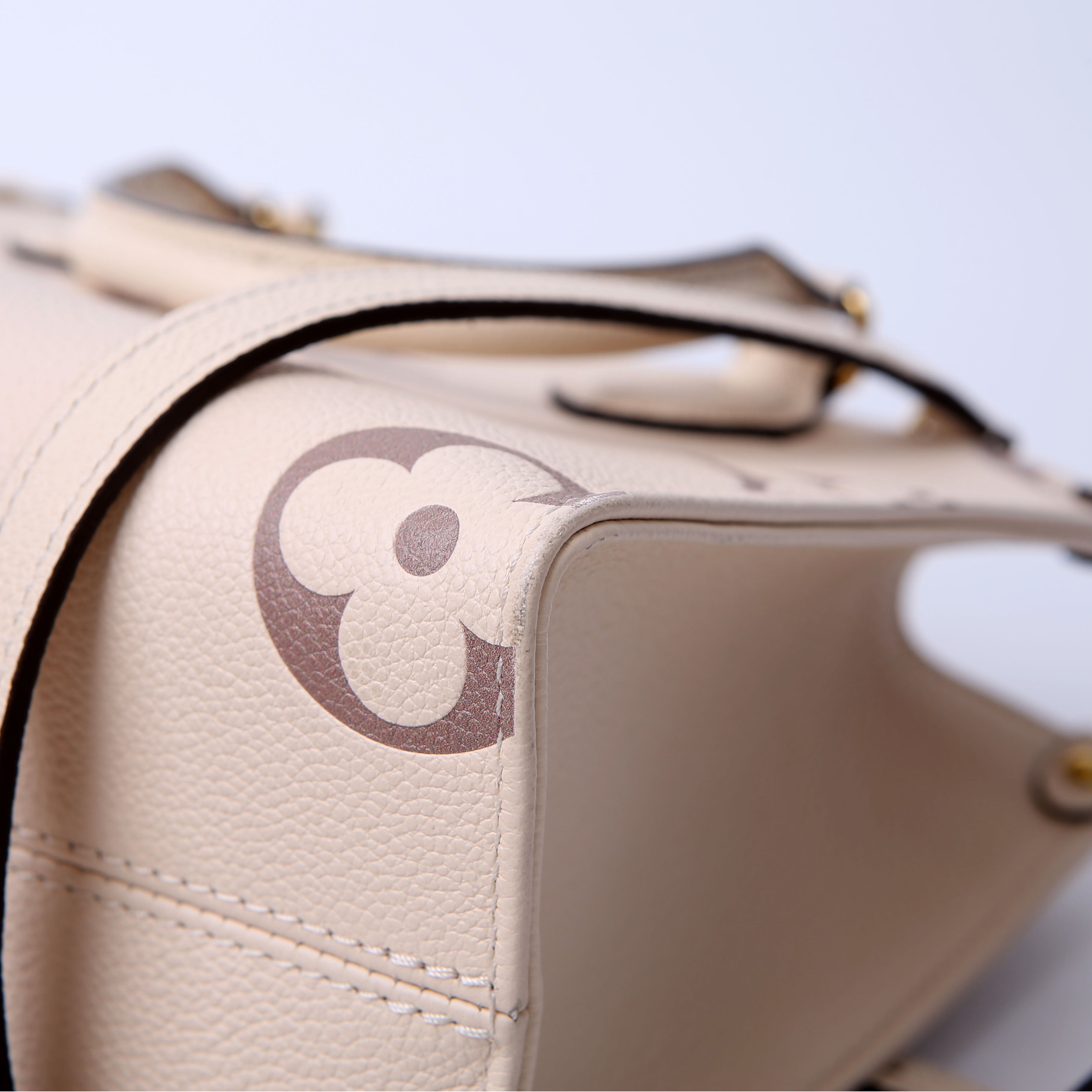 Louis Vuitton ONTHEGO PM Bicolor Empreinte Cream/Taupe