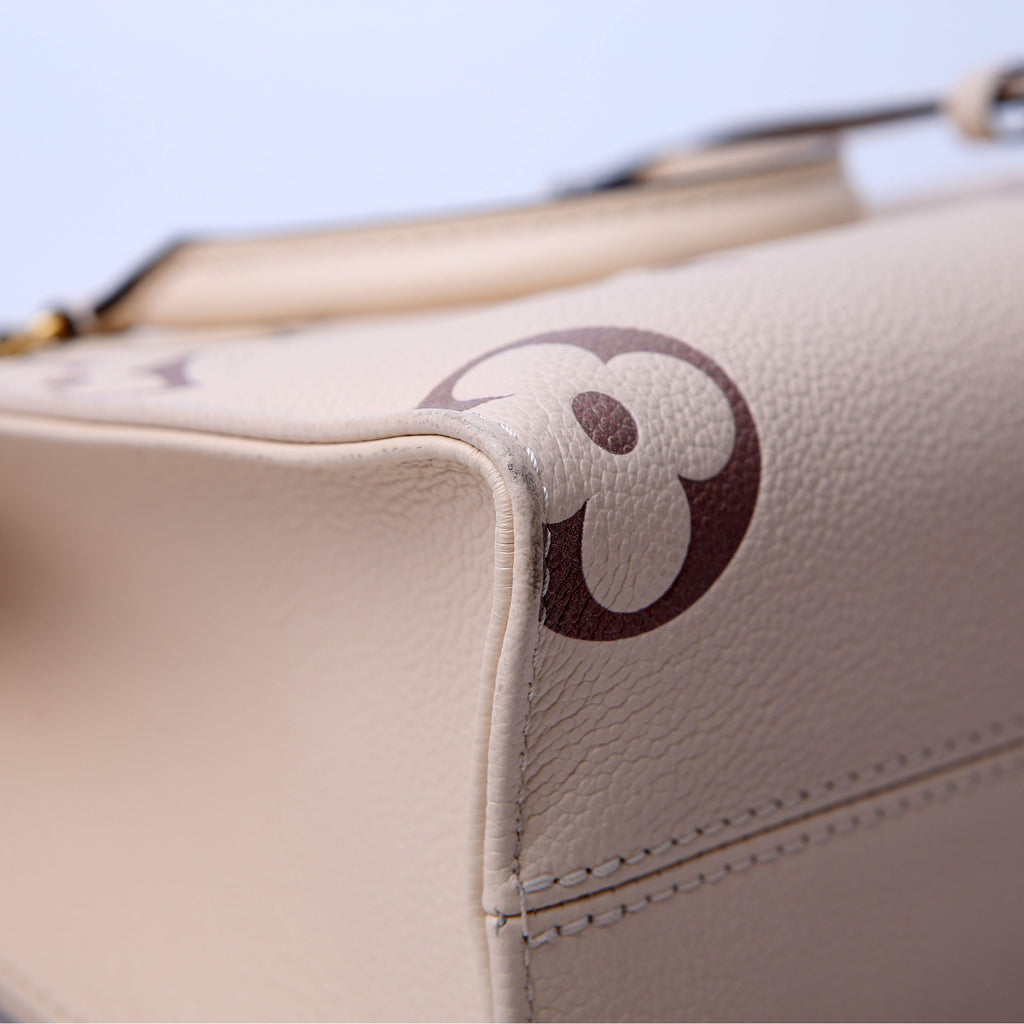 Louis Vuitton ONTHEGO PM Bicolor Empreinte Cream/Taupe