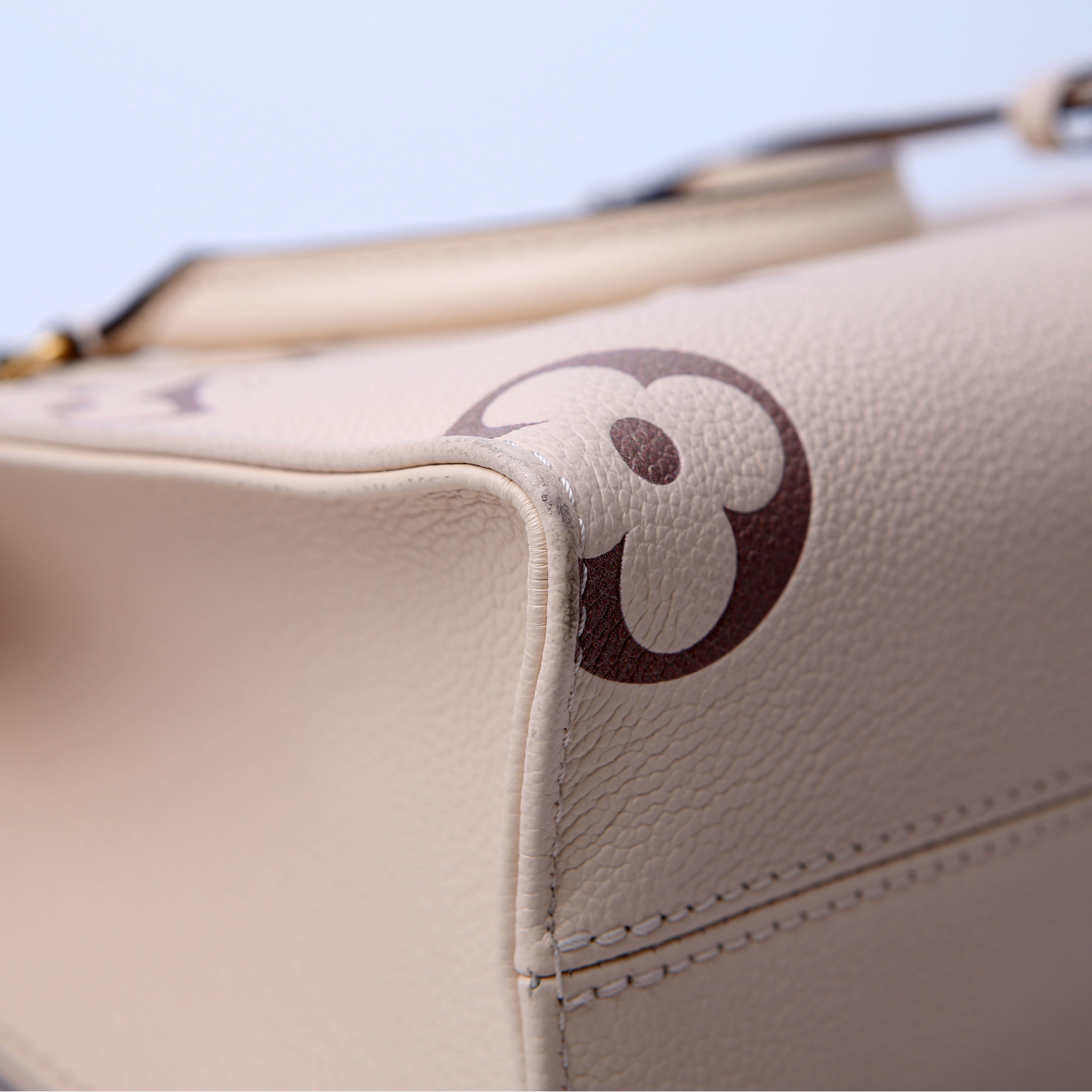 Louis Vuitton ONTHEGO PM Bicolor Empreinte Cream/Taupe