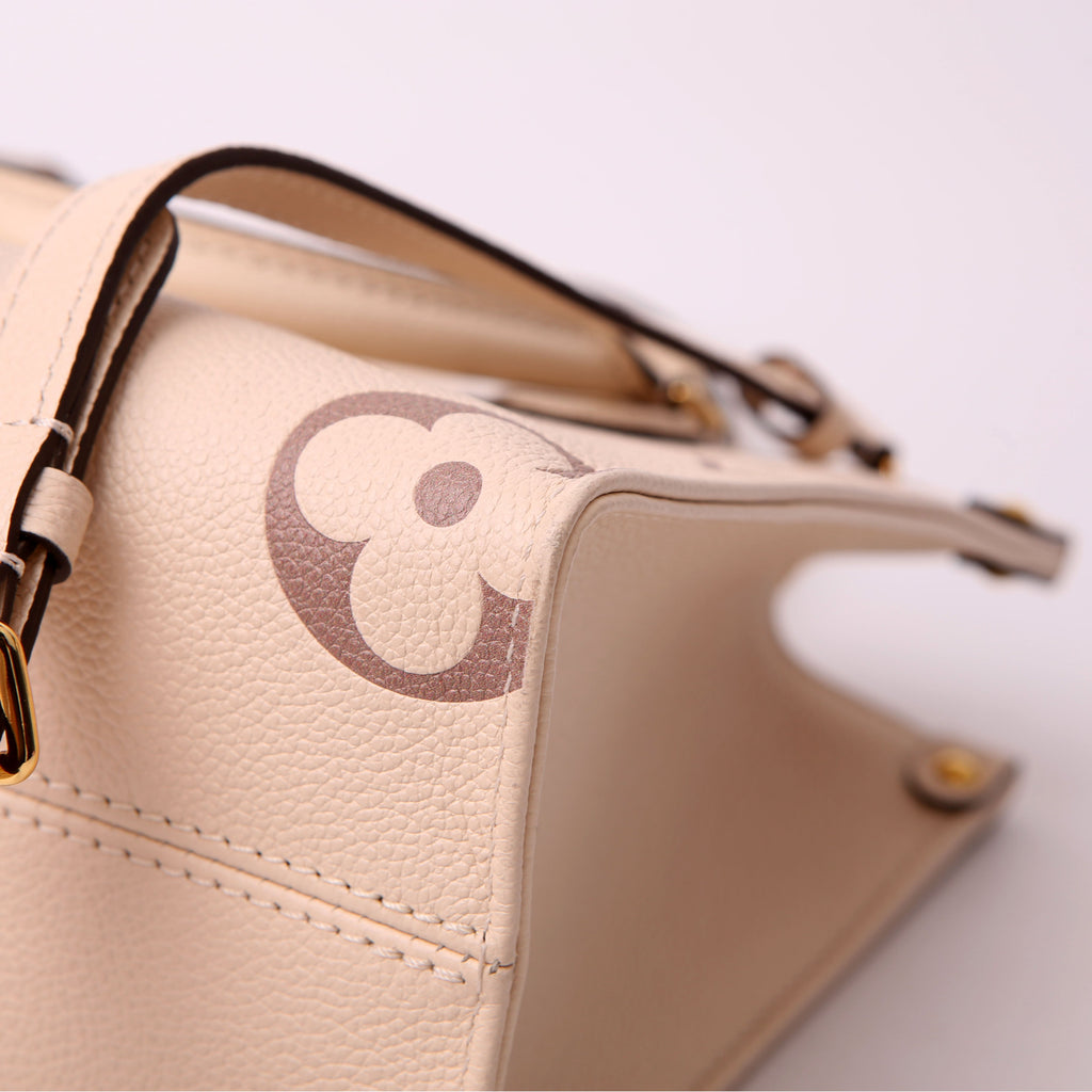 Louis Vuitton ONTHEGO PM Bicolor Empreinte Cream/Taupe