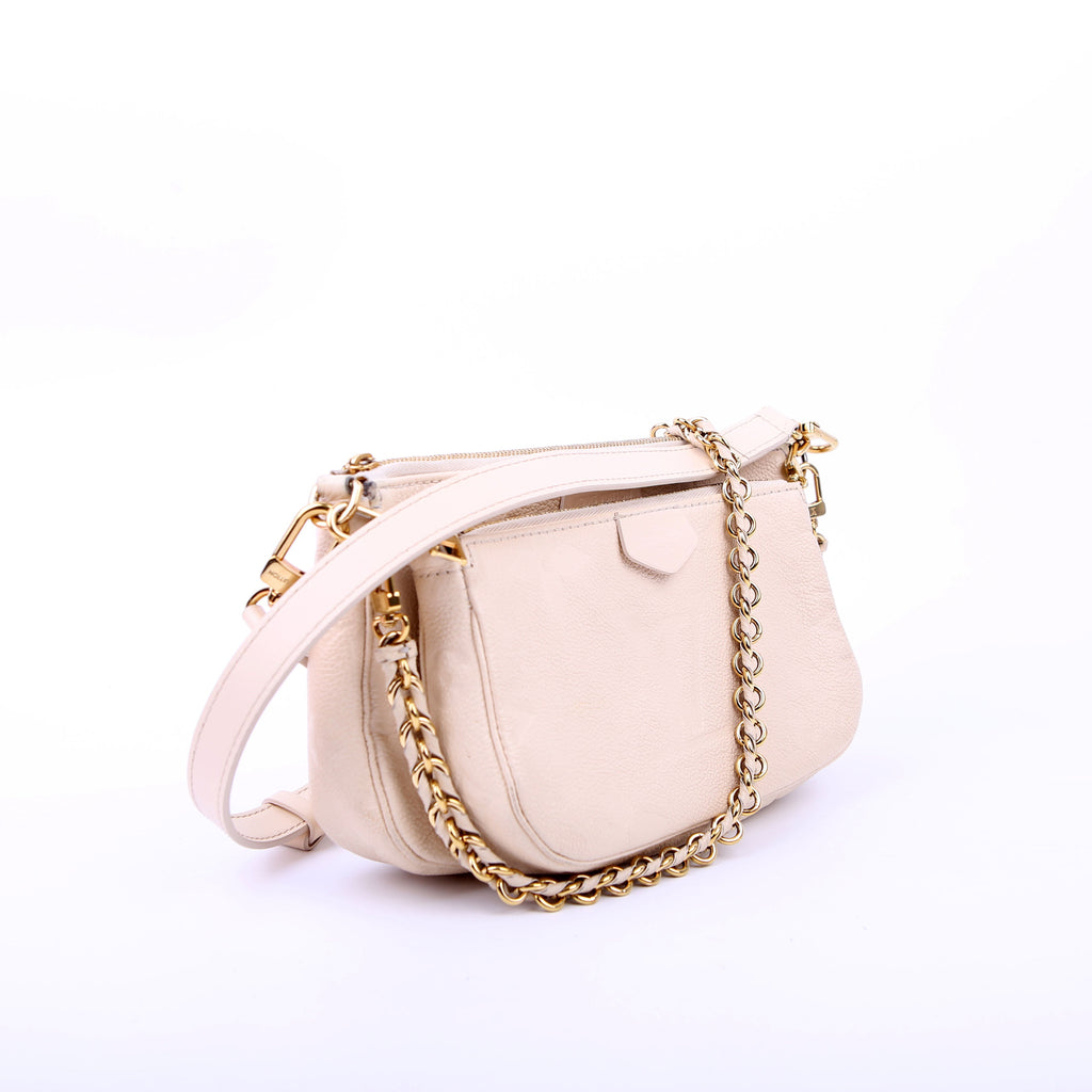 Louis Vuitton Multi Pochette Empreinte White