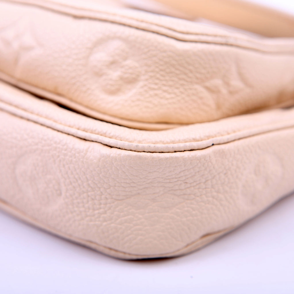 Louis Vuitton Multi Pochette Empreinte White