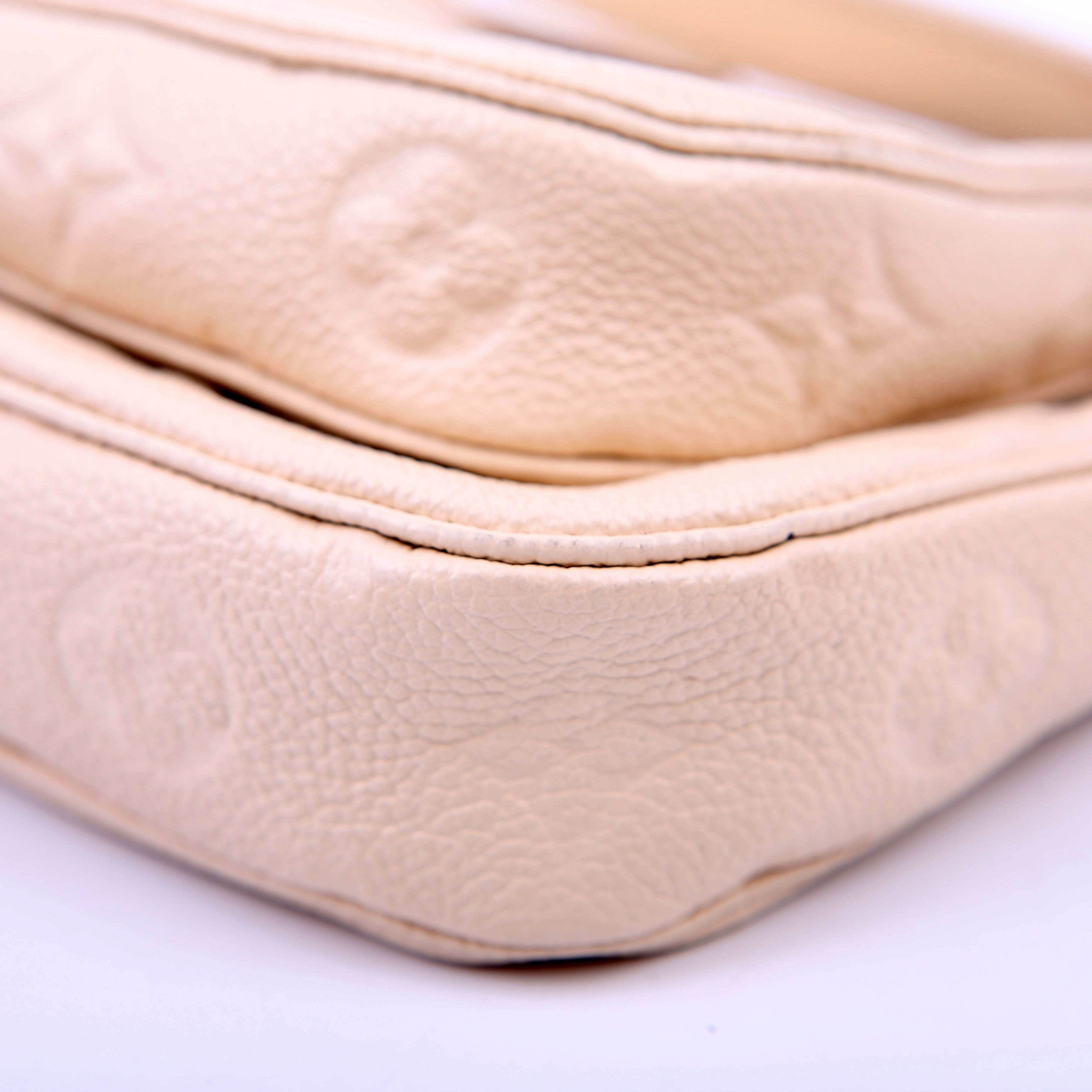Louis Vuitton Multi Pochette Empreinte White