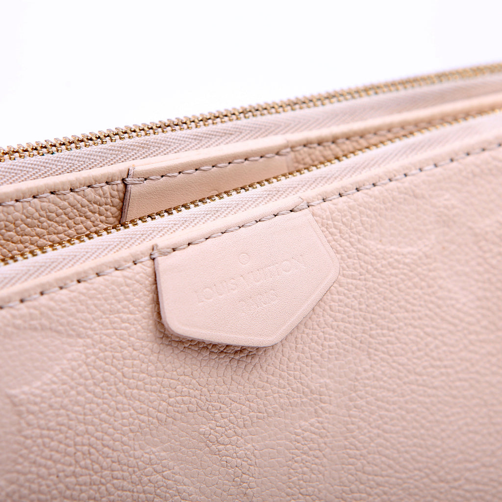 Louis Vuitton Multi Pochette Empreinte White