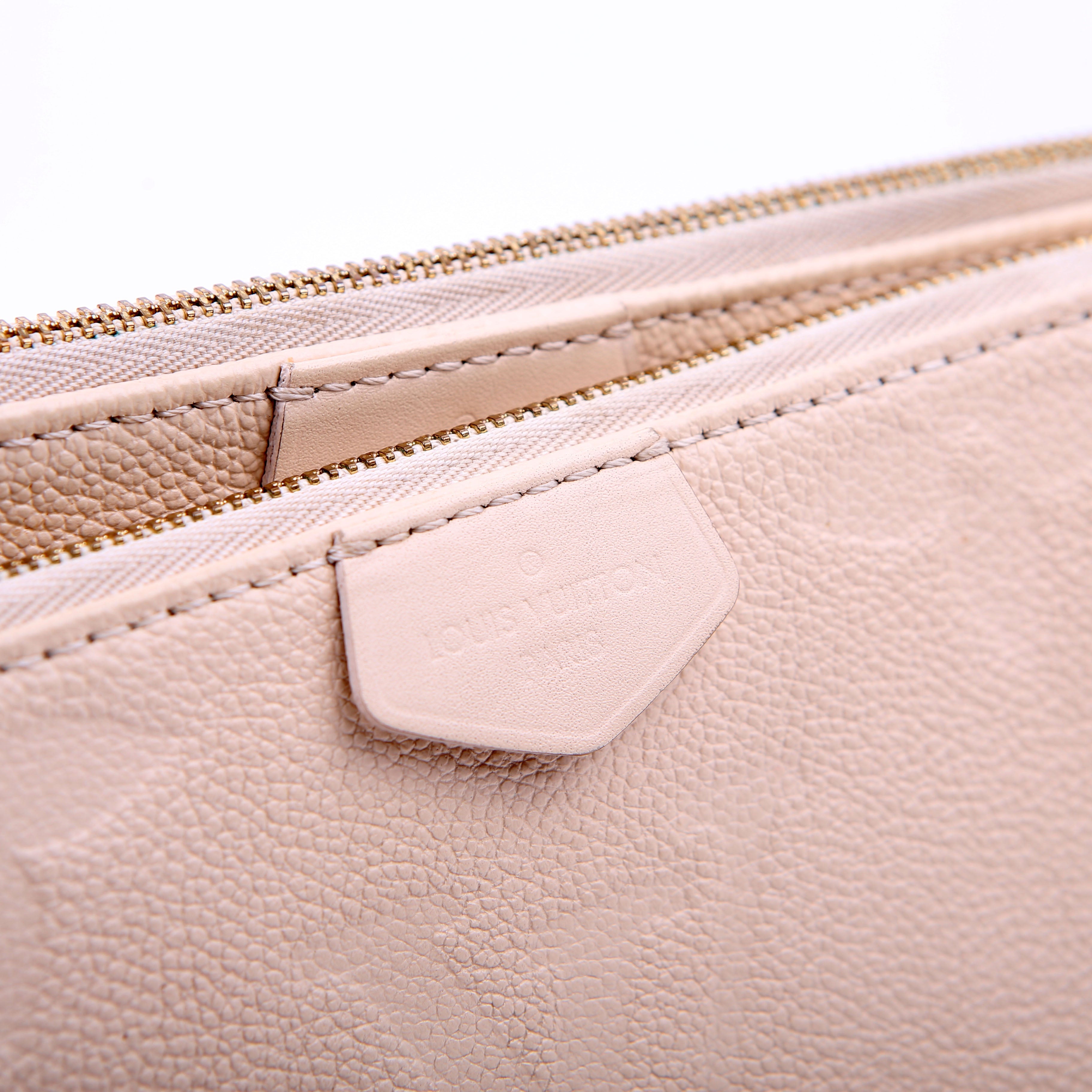 Louis Vuitton Multi Pochette Empreinte White