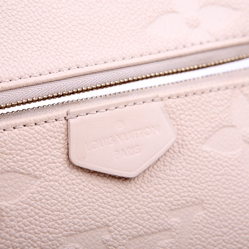 Louis Vuitton Multi Pochette Empreinte White