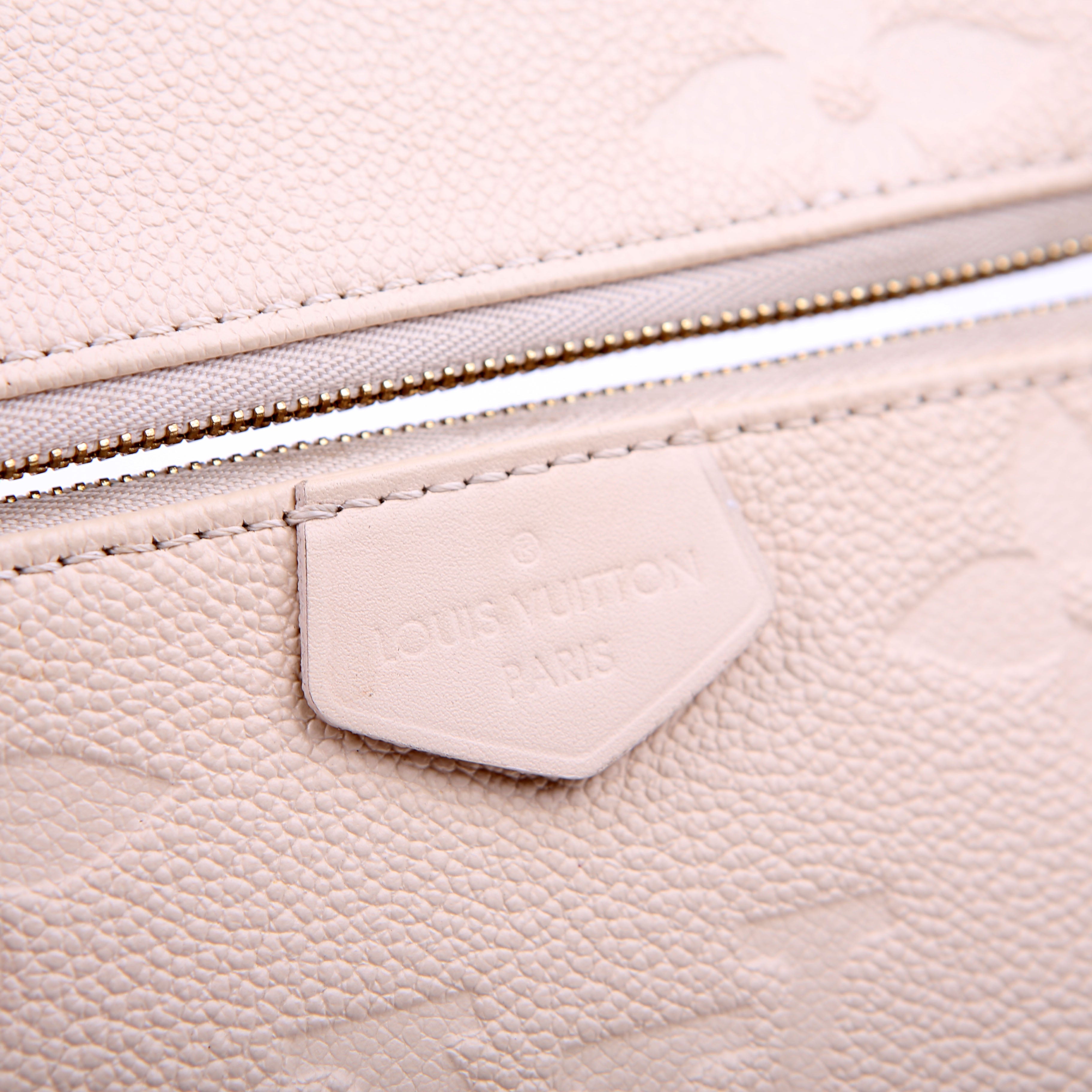 Louis Vuitton Multi Pochette Empreinte White