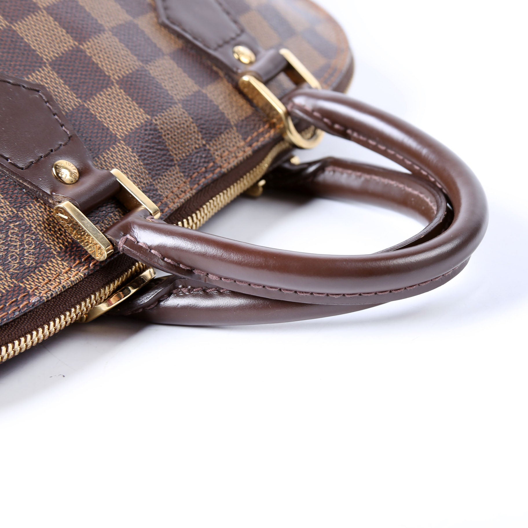 Louis Vuitton Alma PM Ebene Older