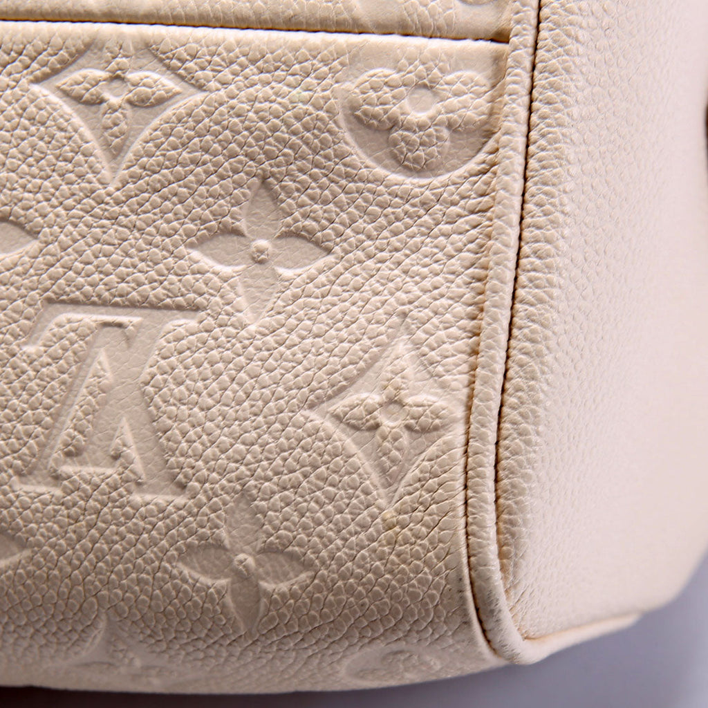 Louis Vuitton Speedy 25 Bandouliere Empreinte NM Cream
