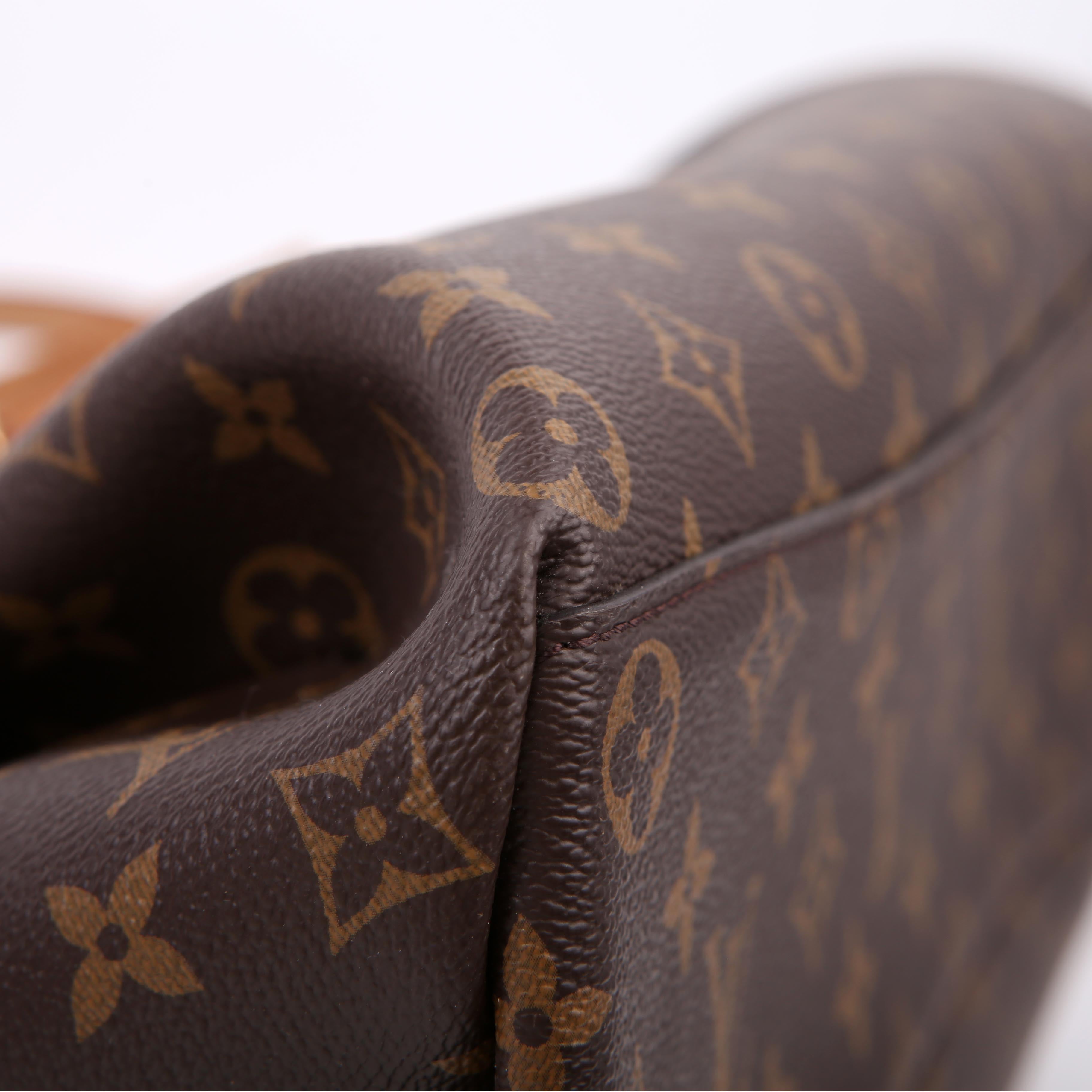 Louis Vuitton Rivoli NM MM Monogram