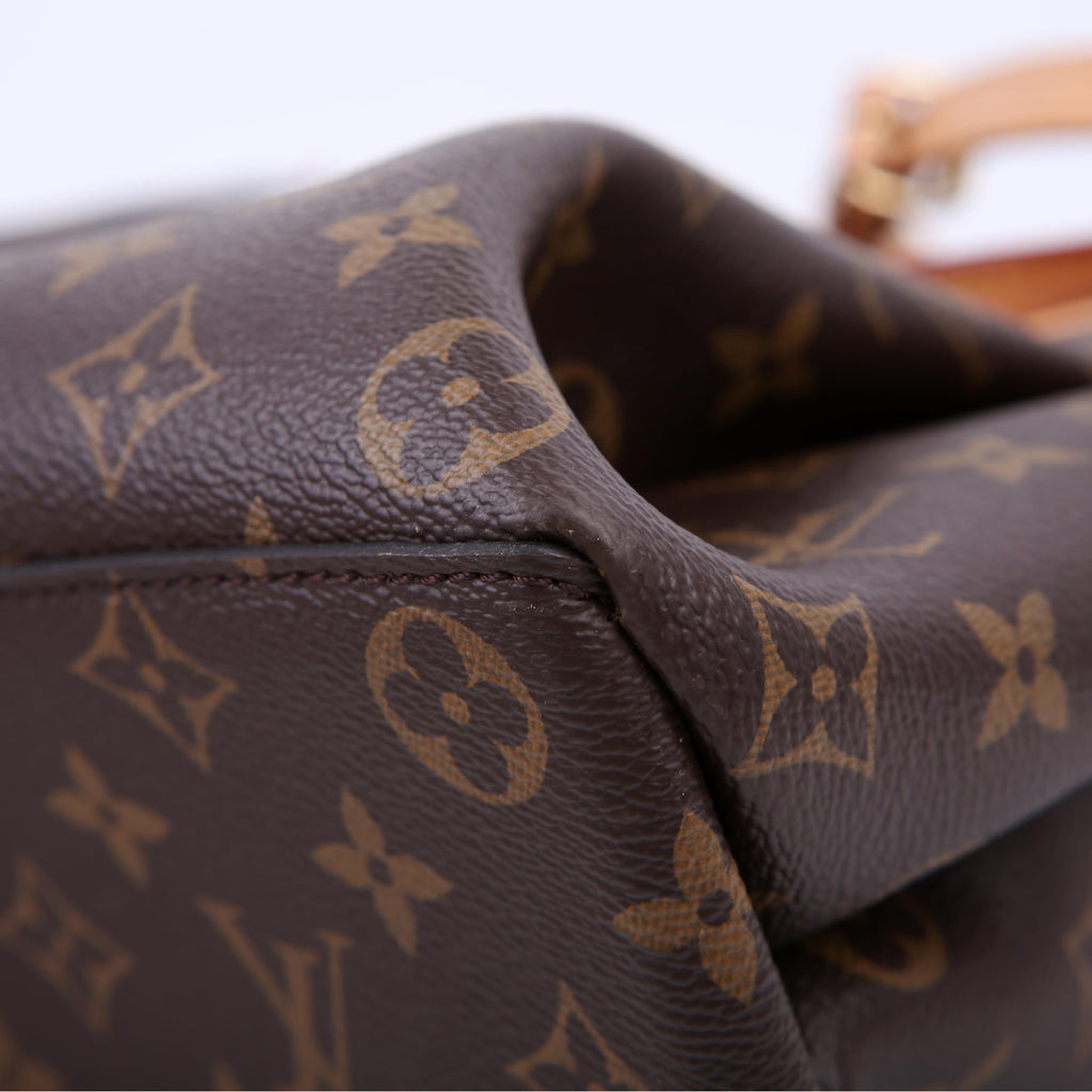 Louis Vuitton Rivoli NM MM Monogram