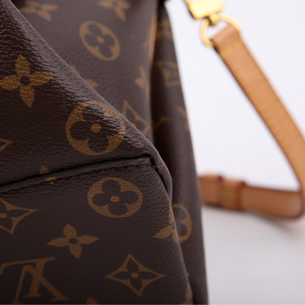Louis Vuitton Rivoli NM MM Monogram
