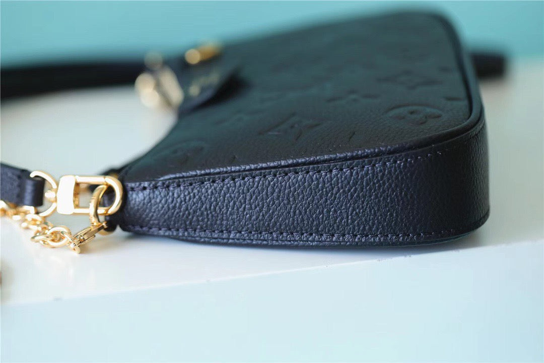 Louis Vuitton Easy Pouch On Strap Monogram Empreinte Black For Women, Women’s Handbags, Shoulder Bags And Crossbody Bags 7.5in/19cm Louis Vuitton M80349
