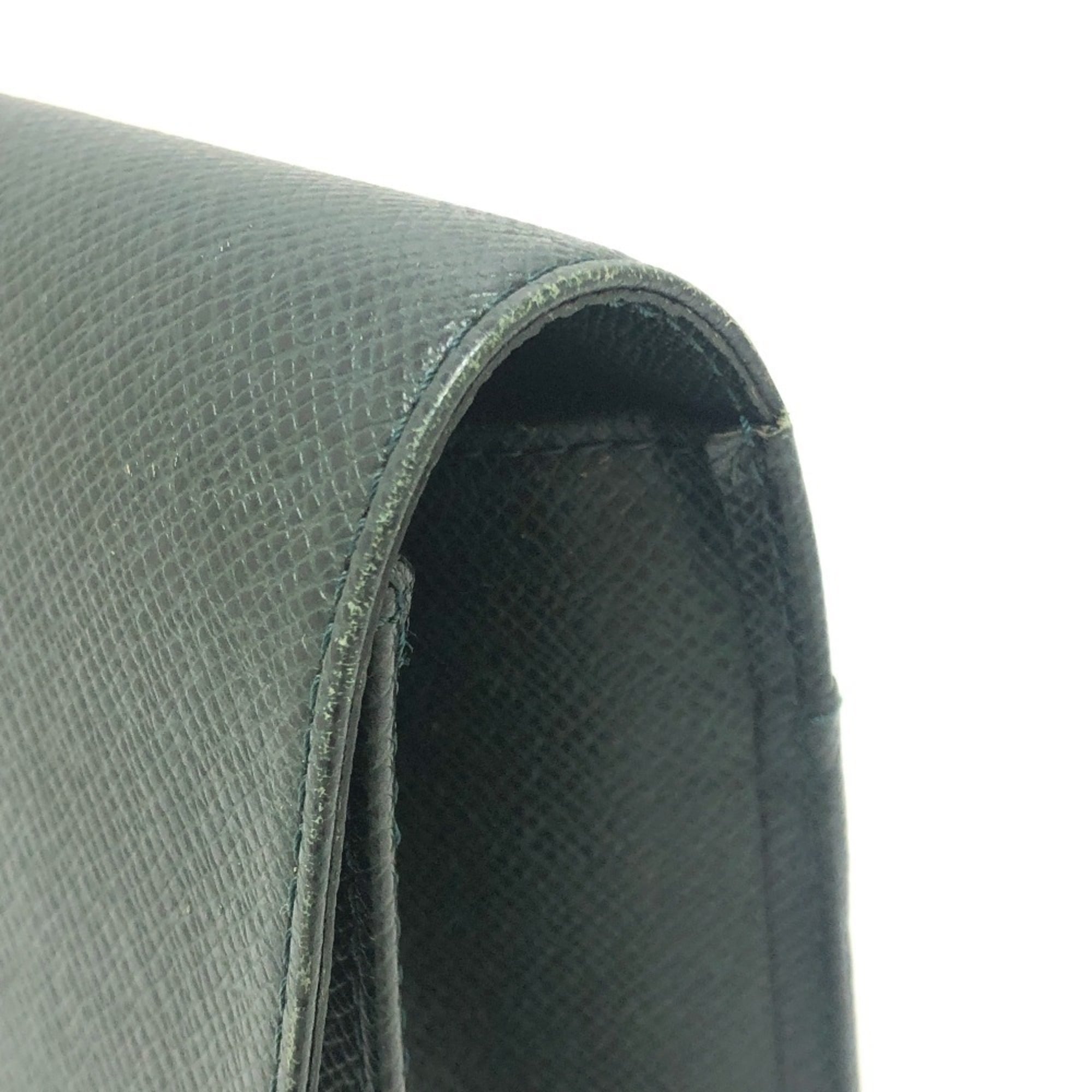 Louis Vuitton Episea Leather Taiga Leather Clutch Bag