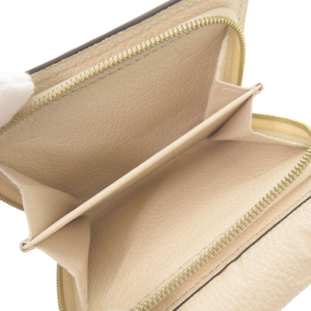 Louis Vuitton Monogram Empreinte Gold Monogram White Monogram Empreinte Wallet (Tri-Fold)