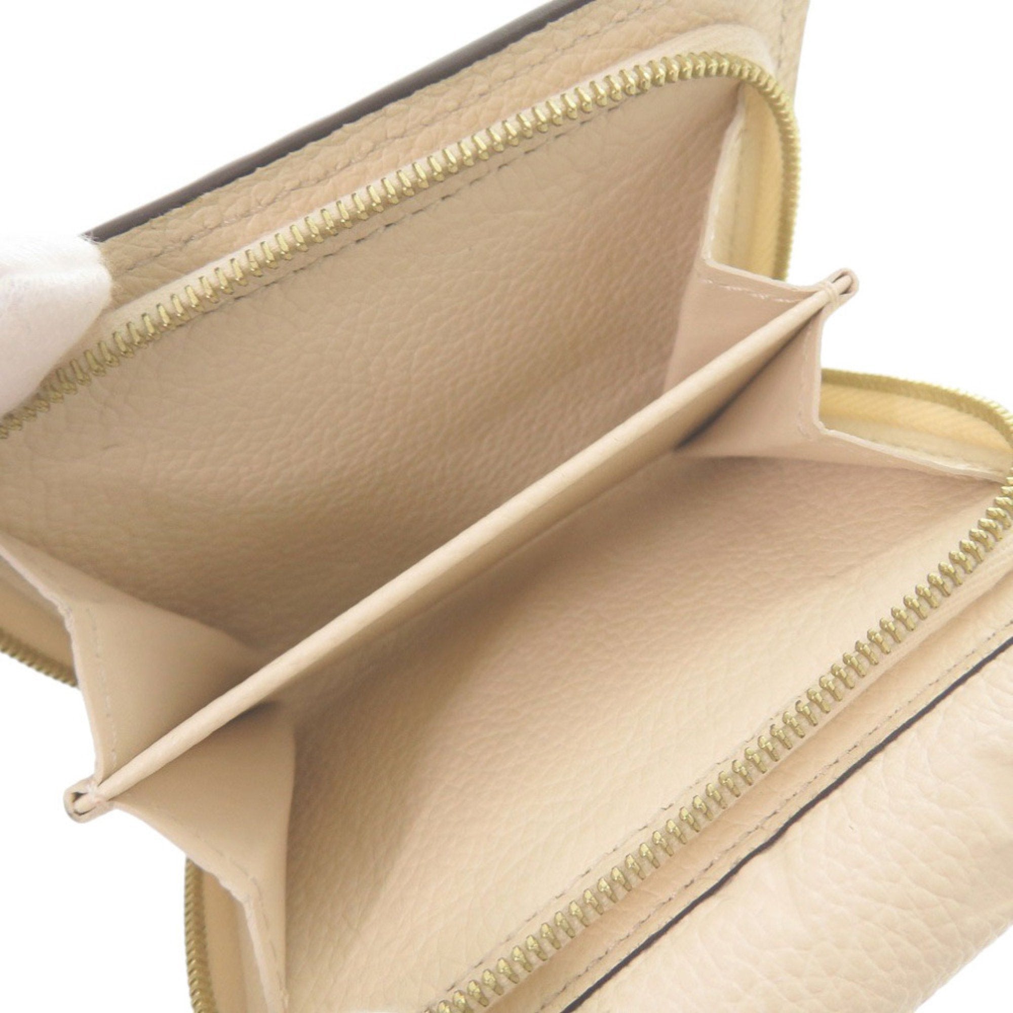 Louis Vuitton Monogram Empreinte Gold Monogram White Monogram Empreinte Wallet (Tri-Fold)