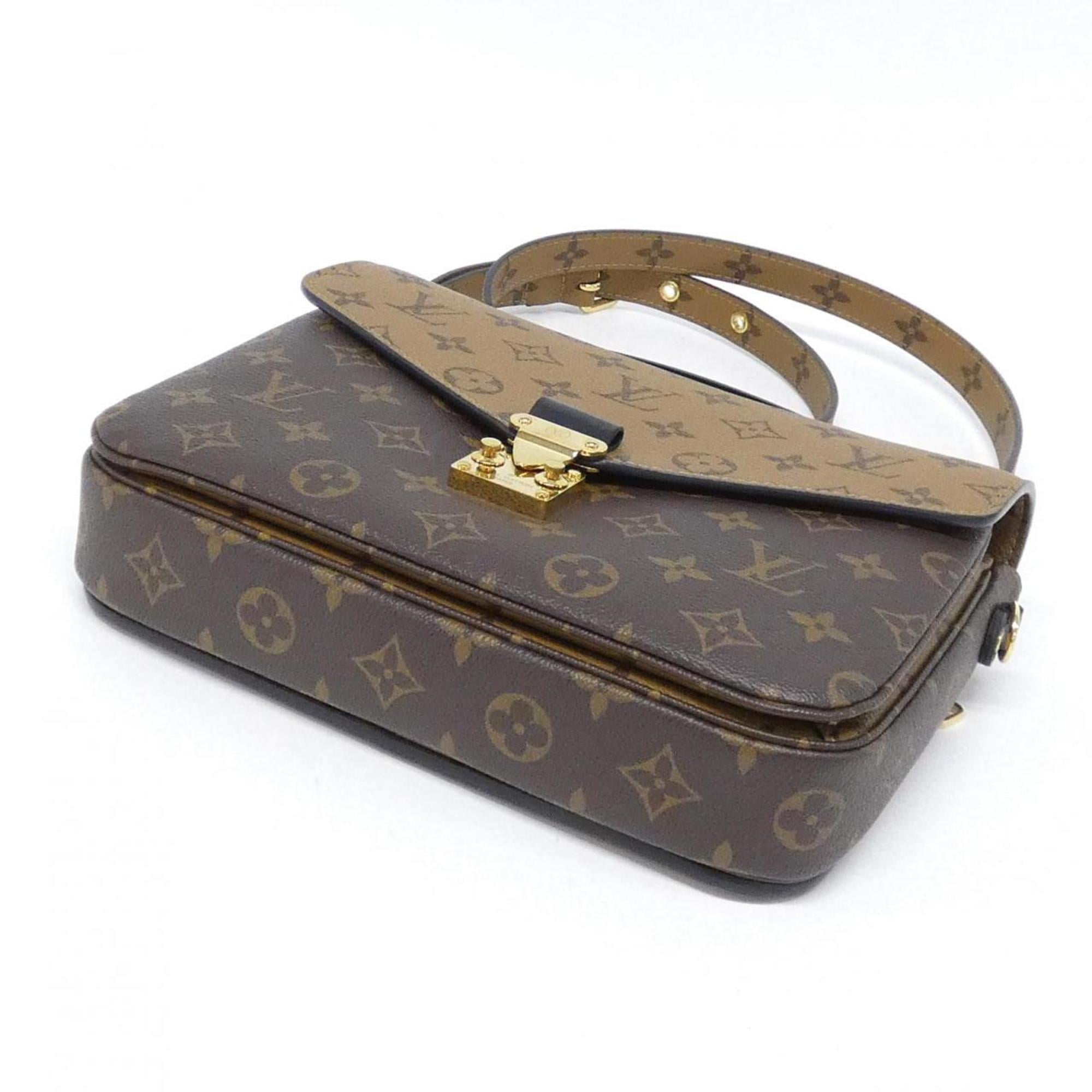 Louis Vuitton Marron Coated Canvas Handbag Pochette