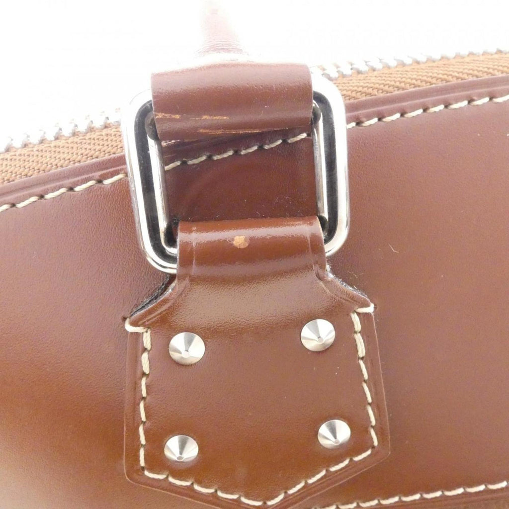 Louis Vuitton Sienne Leather Handbag
