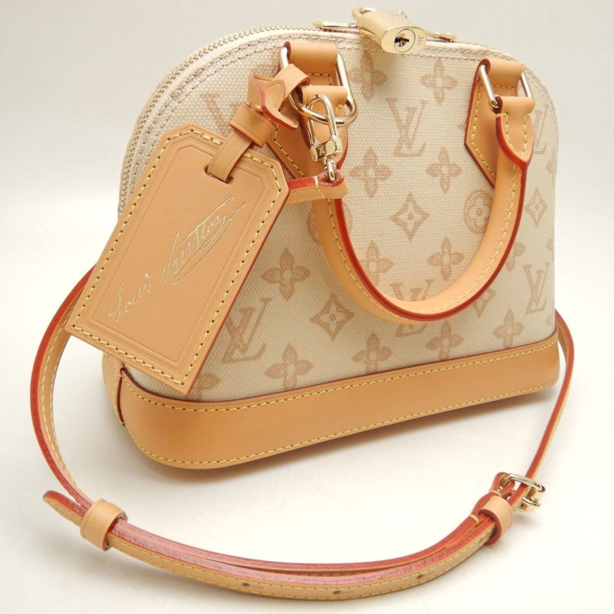 Louis Vuitton Gold Canvas Leather Handbag