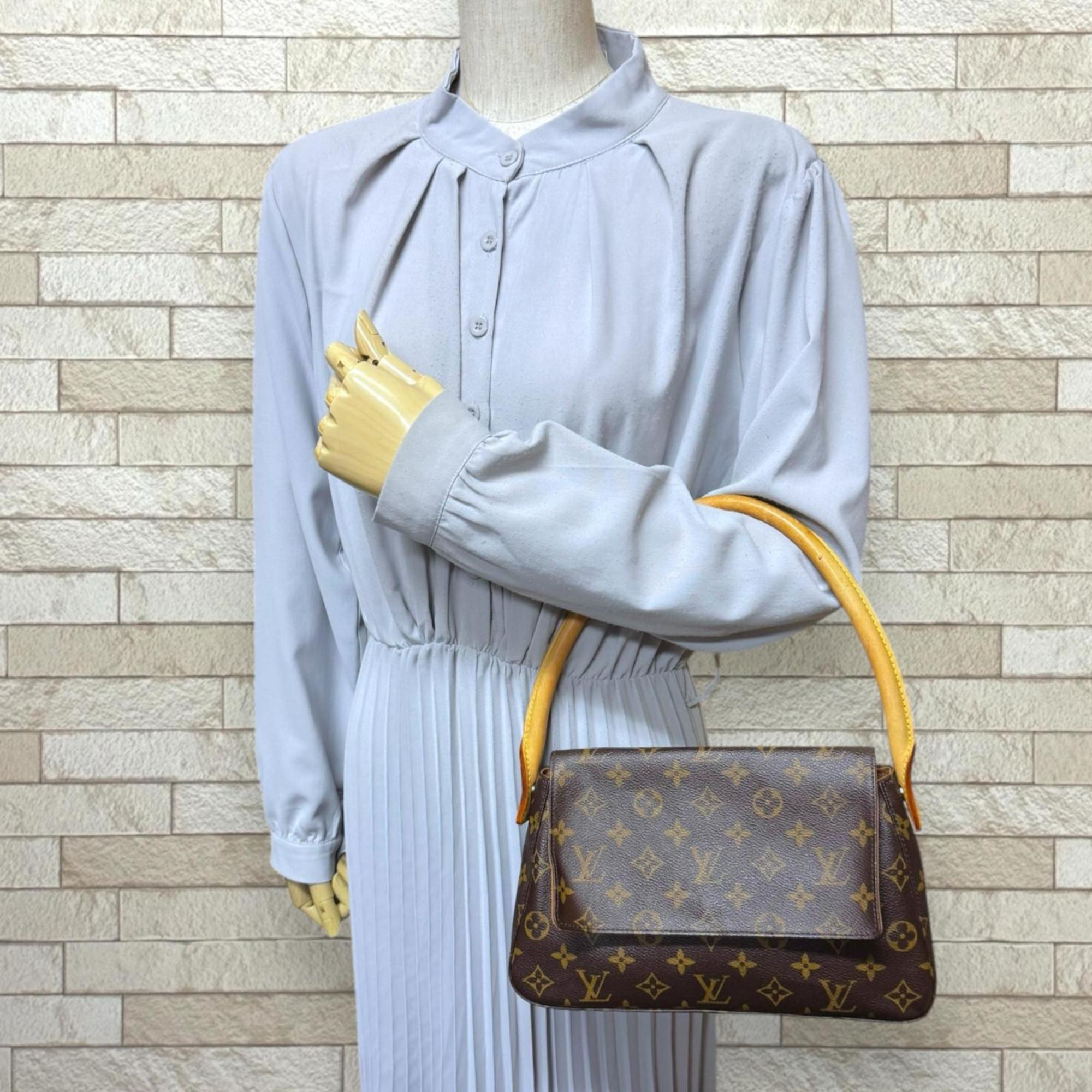 Louis Vuitton Brown Monogram Canvas Handbag