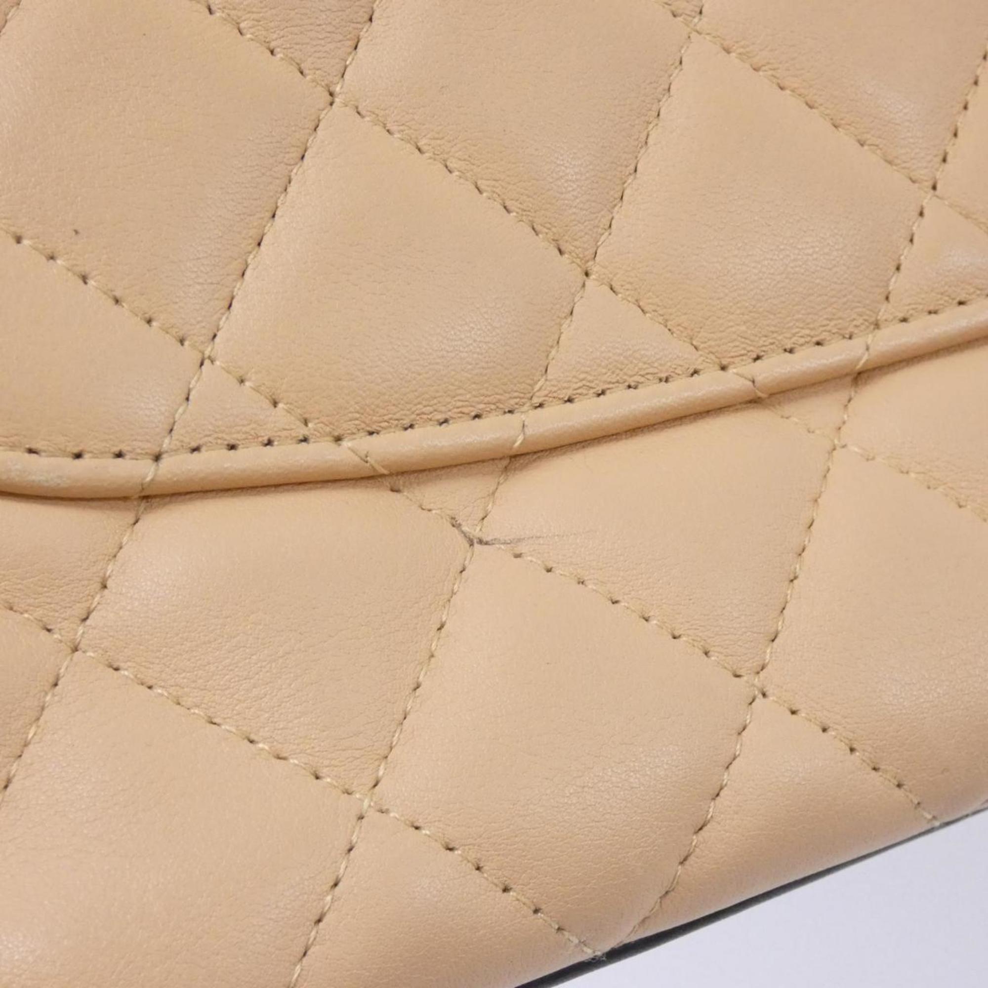 Chanel Beige Black Leather Handbag