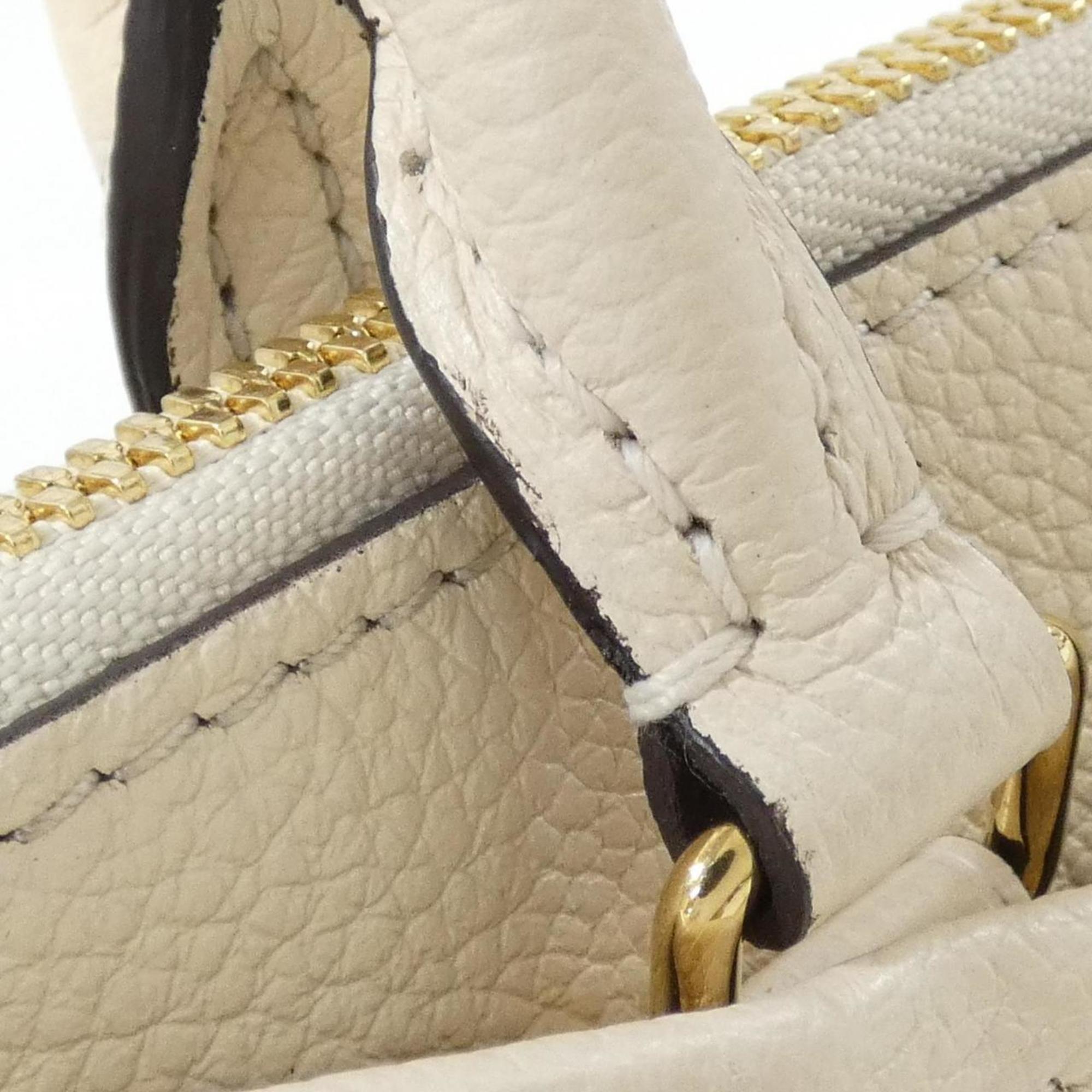 Louis Vuitton Monogram Empreinte Handbag