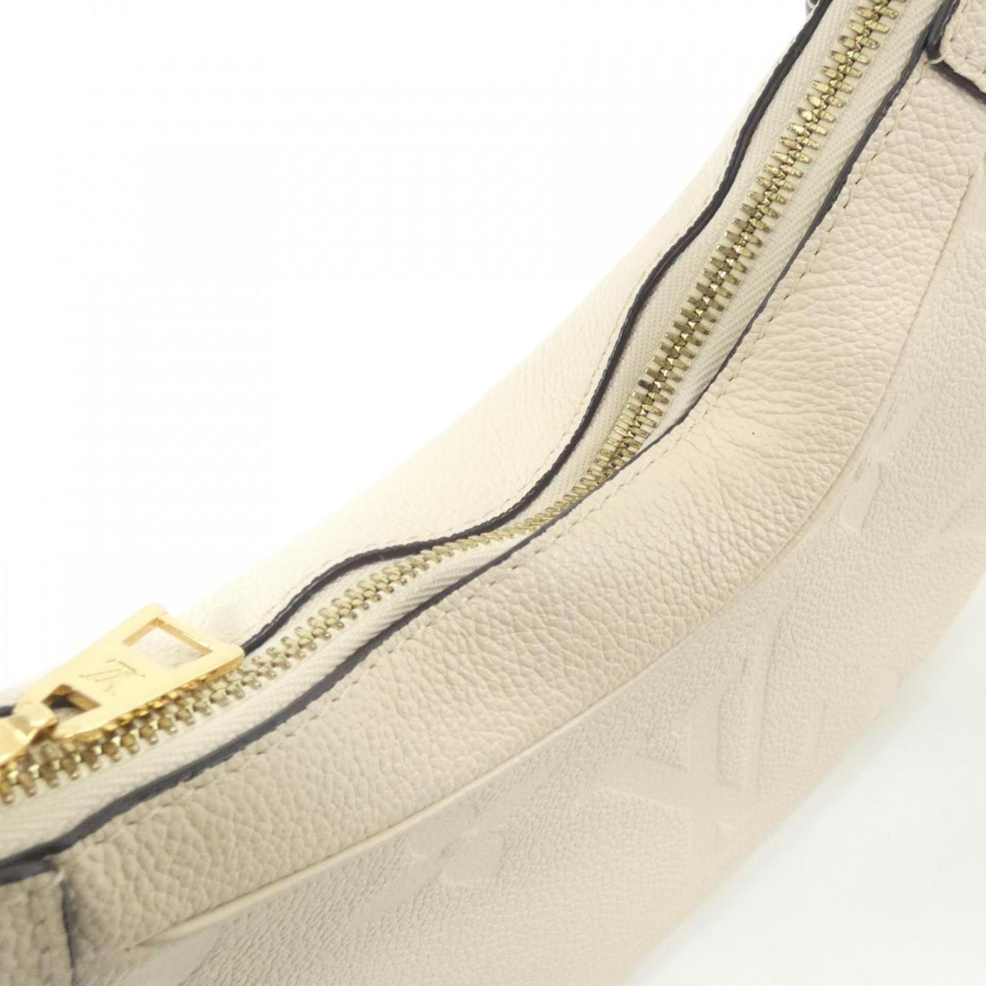 Louis Vuitton Monogram Empreinte Gold Leather Handbag
