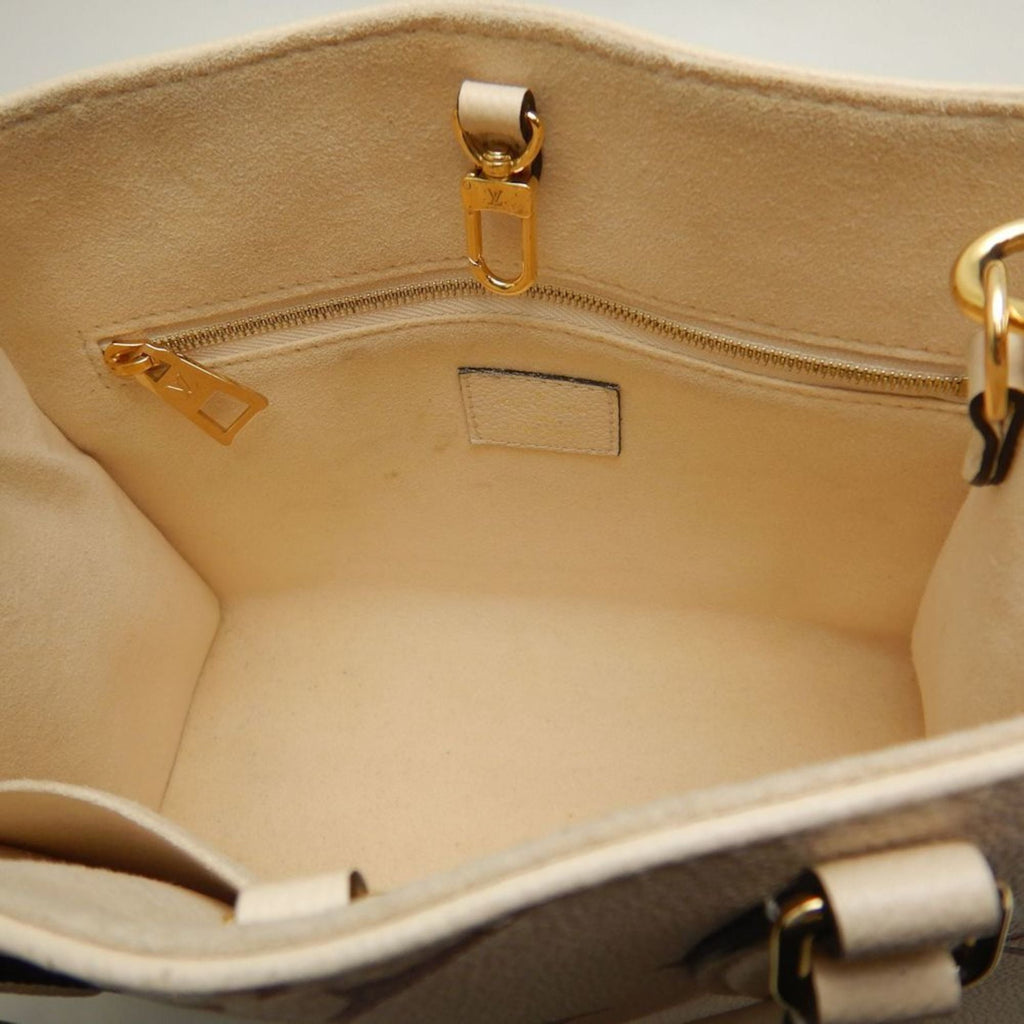 Louis Vuitton Cream Monogram Empreinte Tote Bag